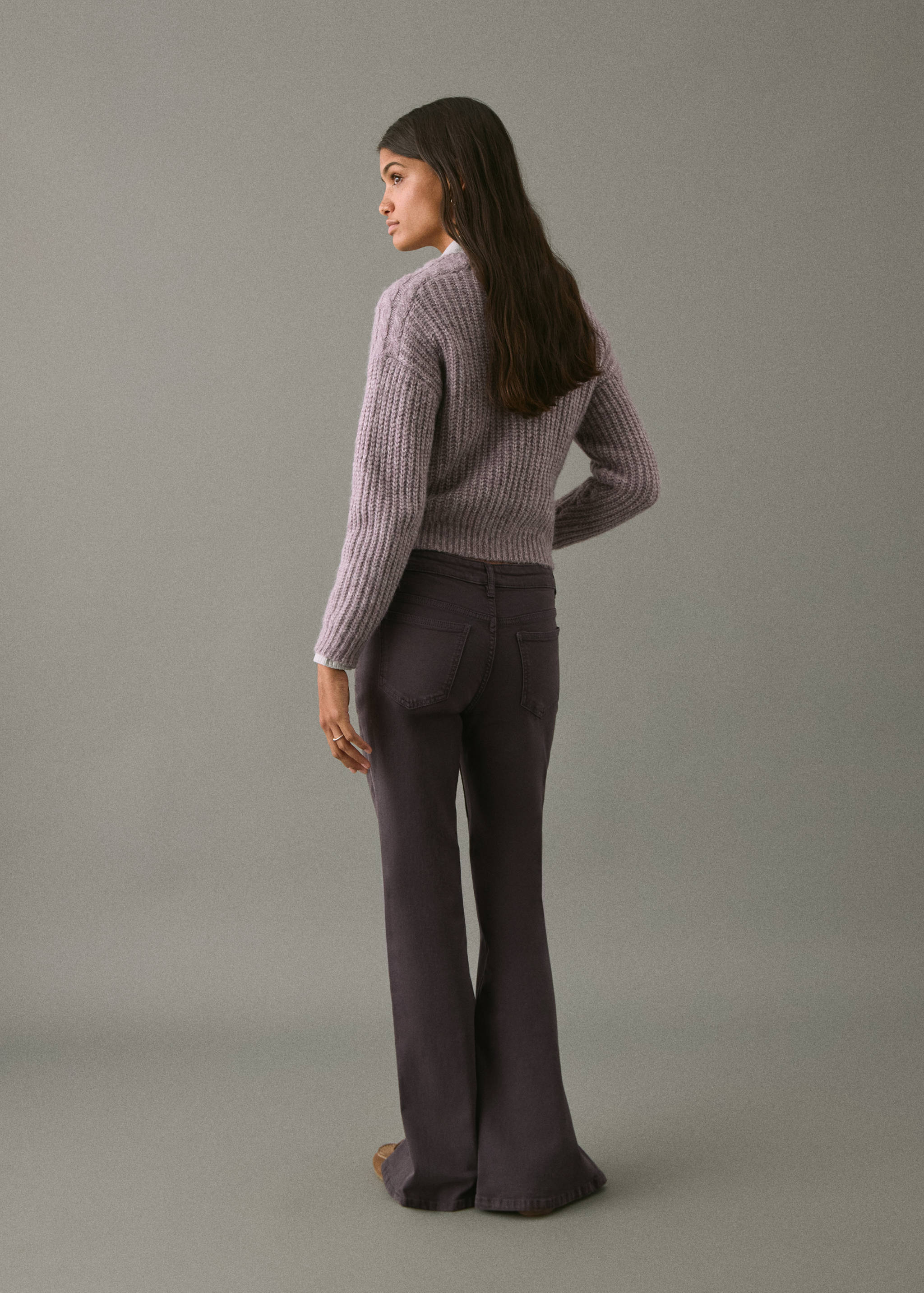 Flared jeans with opening - Reverse of the article