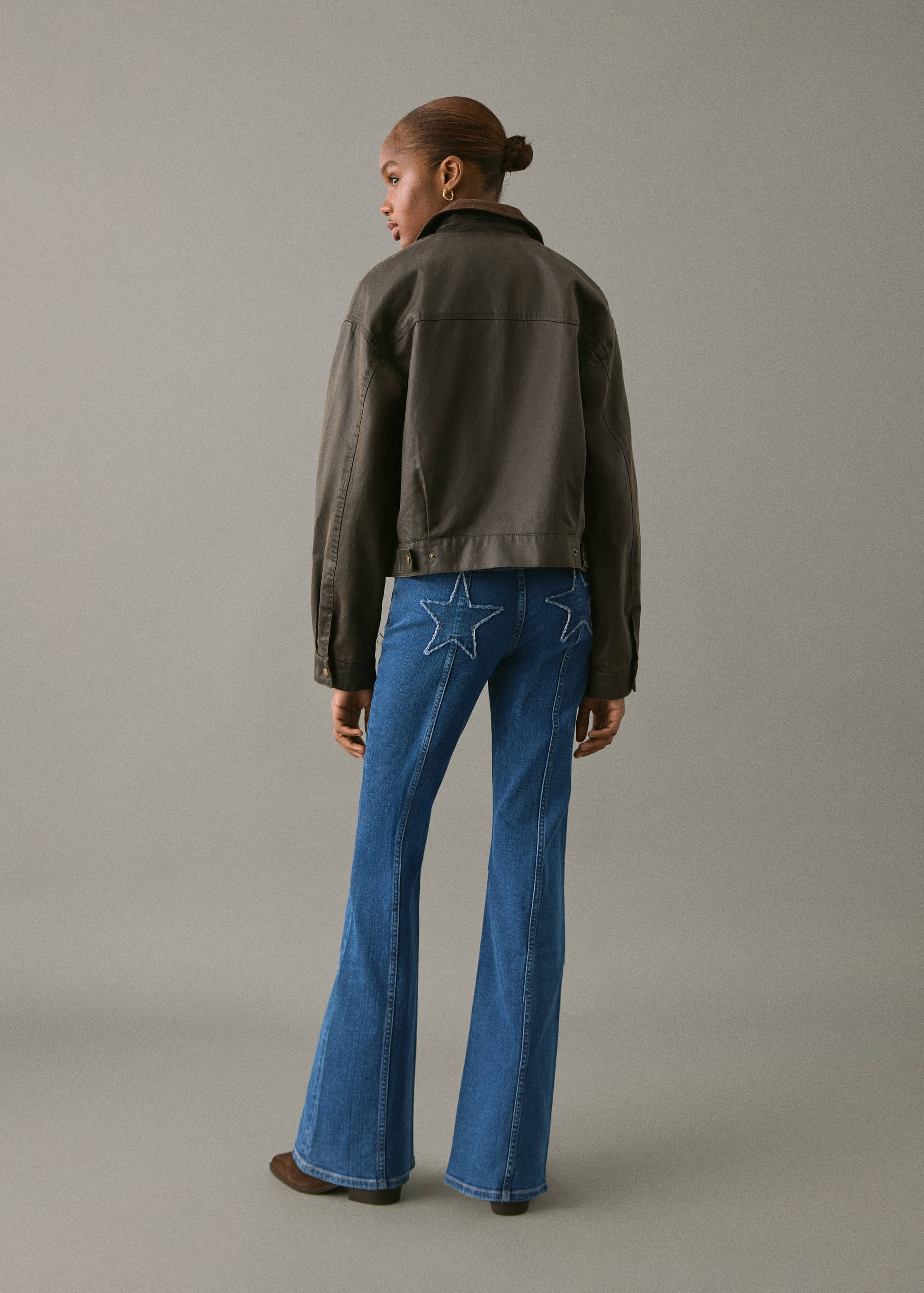 Flared jeans with stars - Reverse of the article