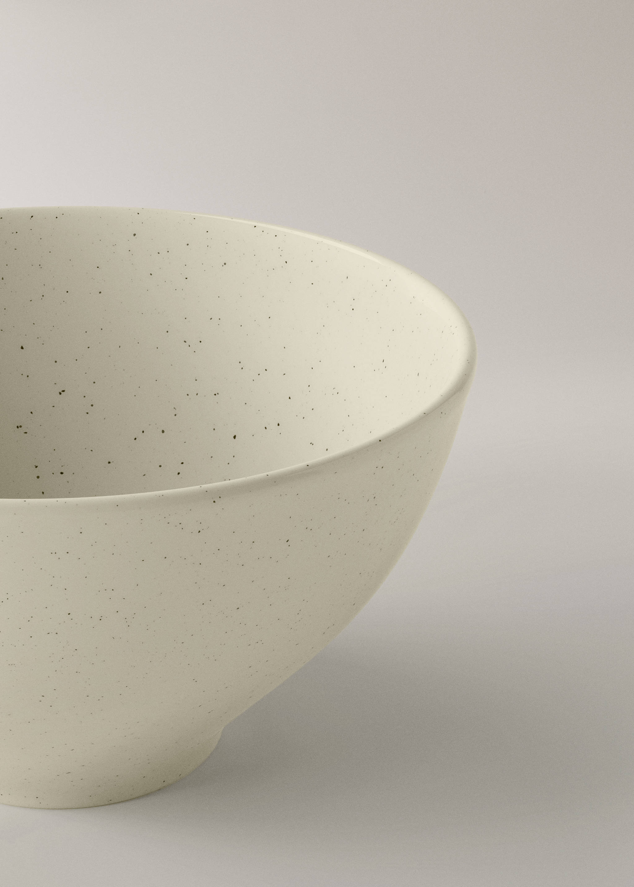 Stoneware bowl with spots - Details of the article 1