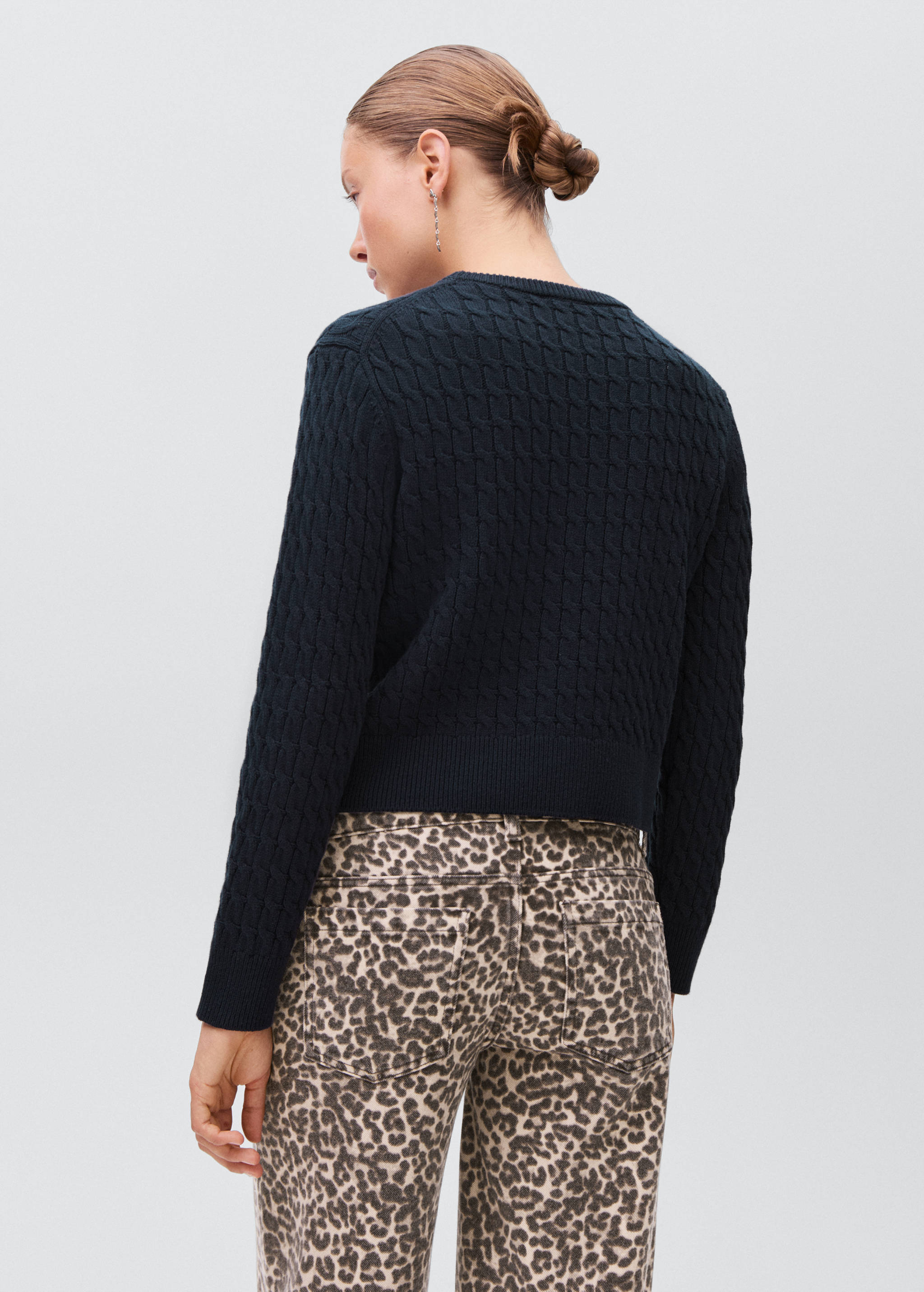 Braided knitted sweater - Reverse of the article