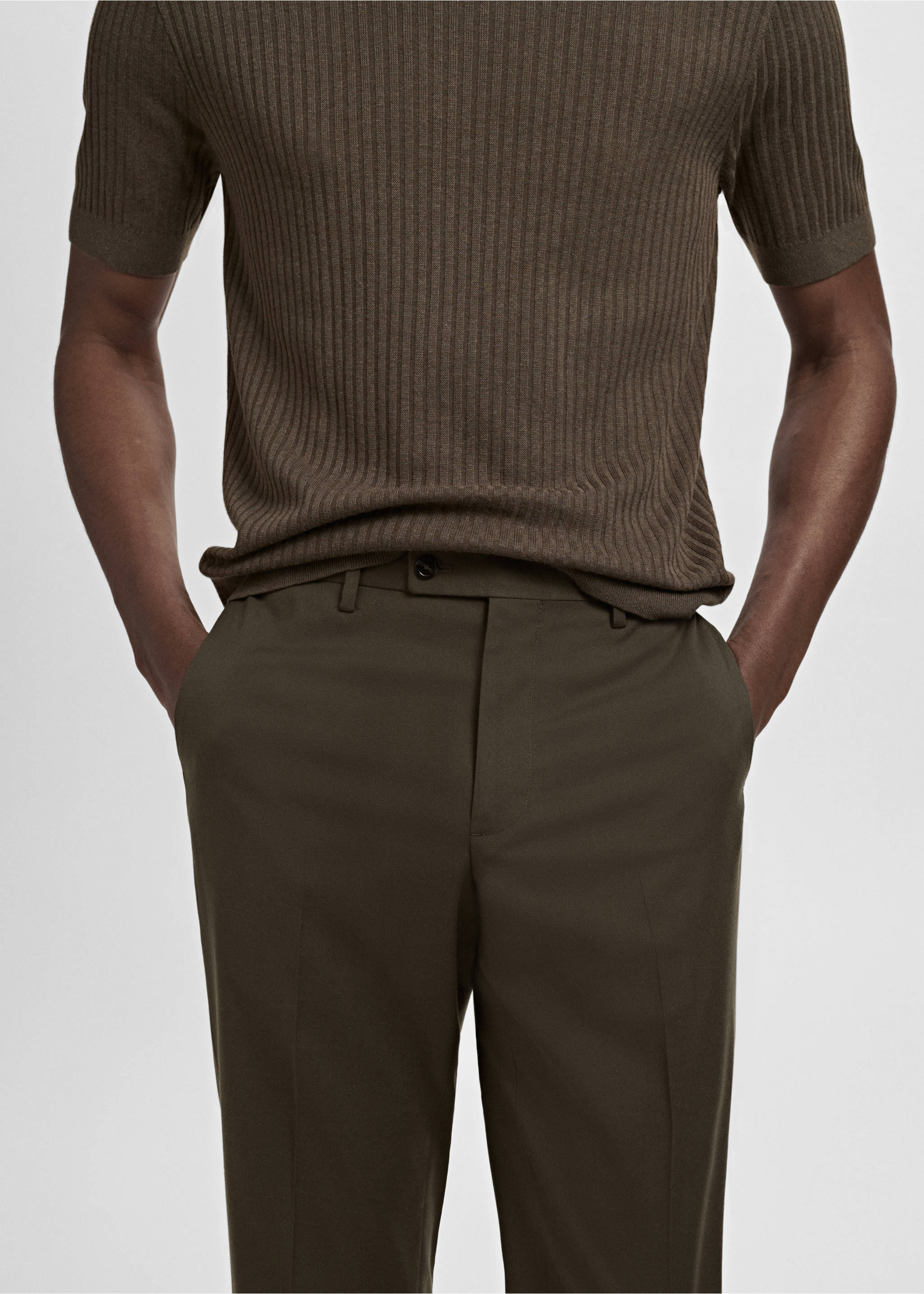 Dark olive green trousers with a structured waistband and side pockets., Khaki. Ref: 17005157-01.