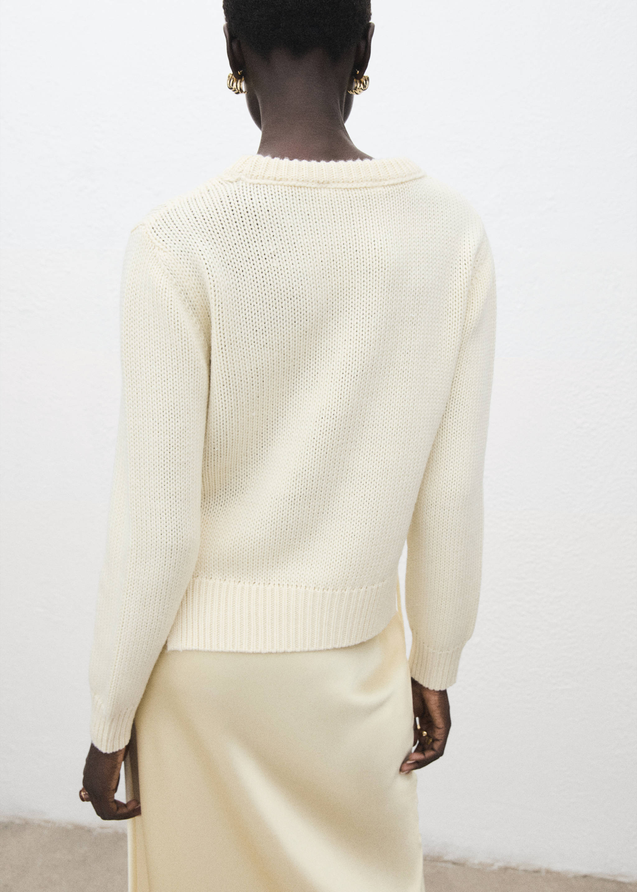 Knitted sweater with tie slits - Reverse of the article
