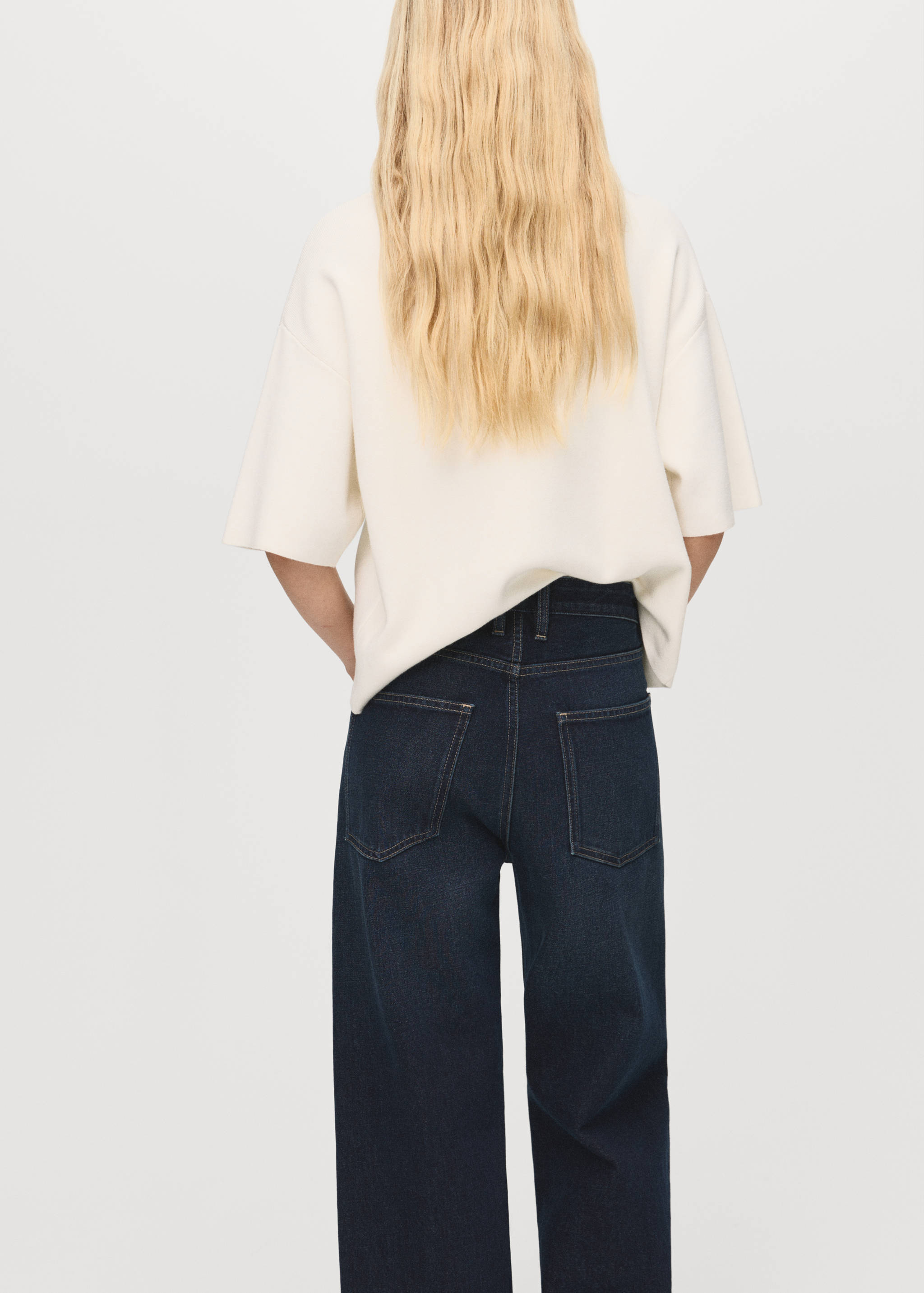 Short-sleeved turtleneck sweater - Reverse of the article