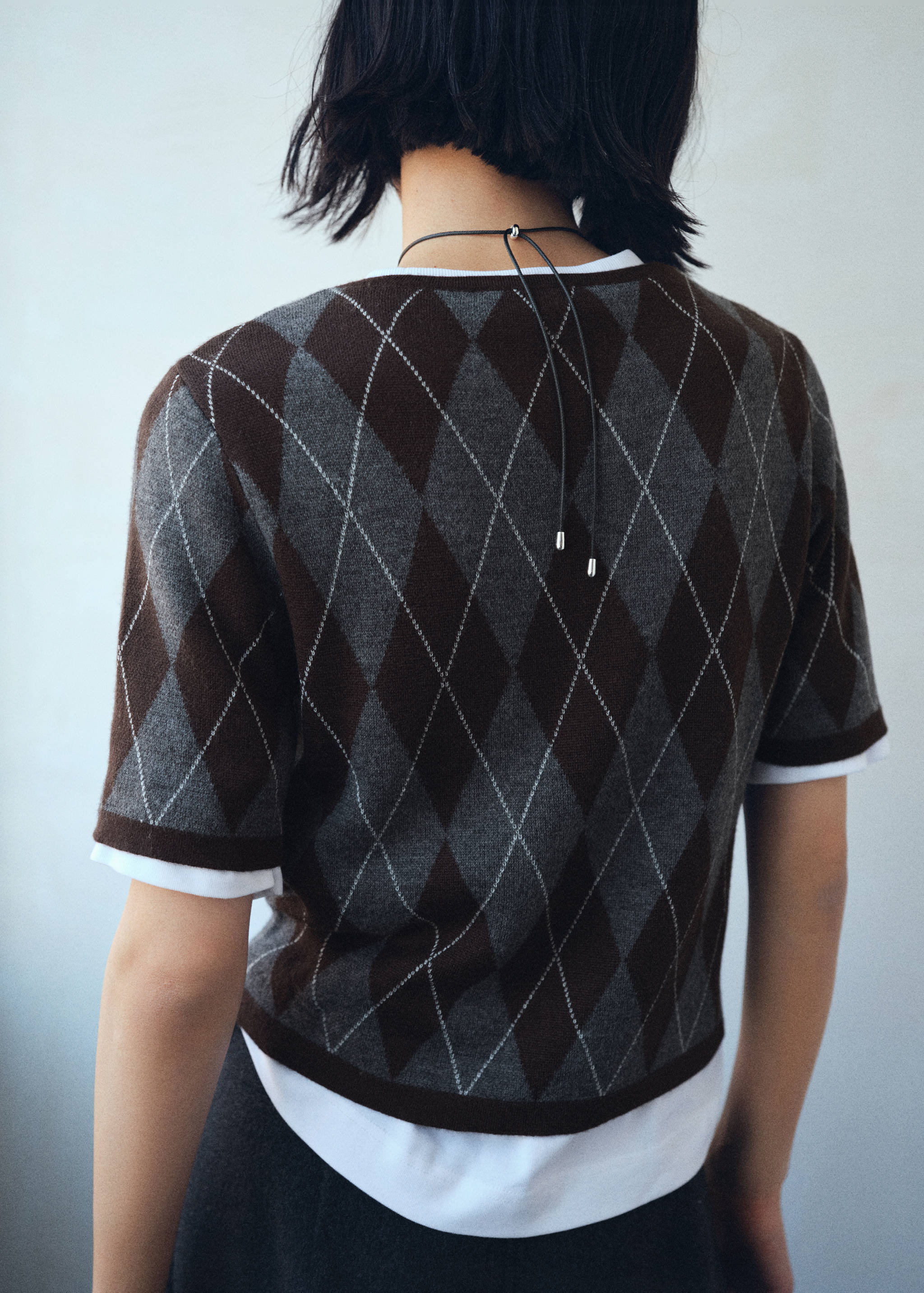 Short-sleeved argyle sweater - Reverse of the article