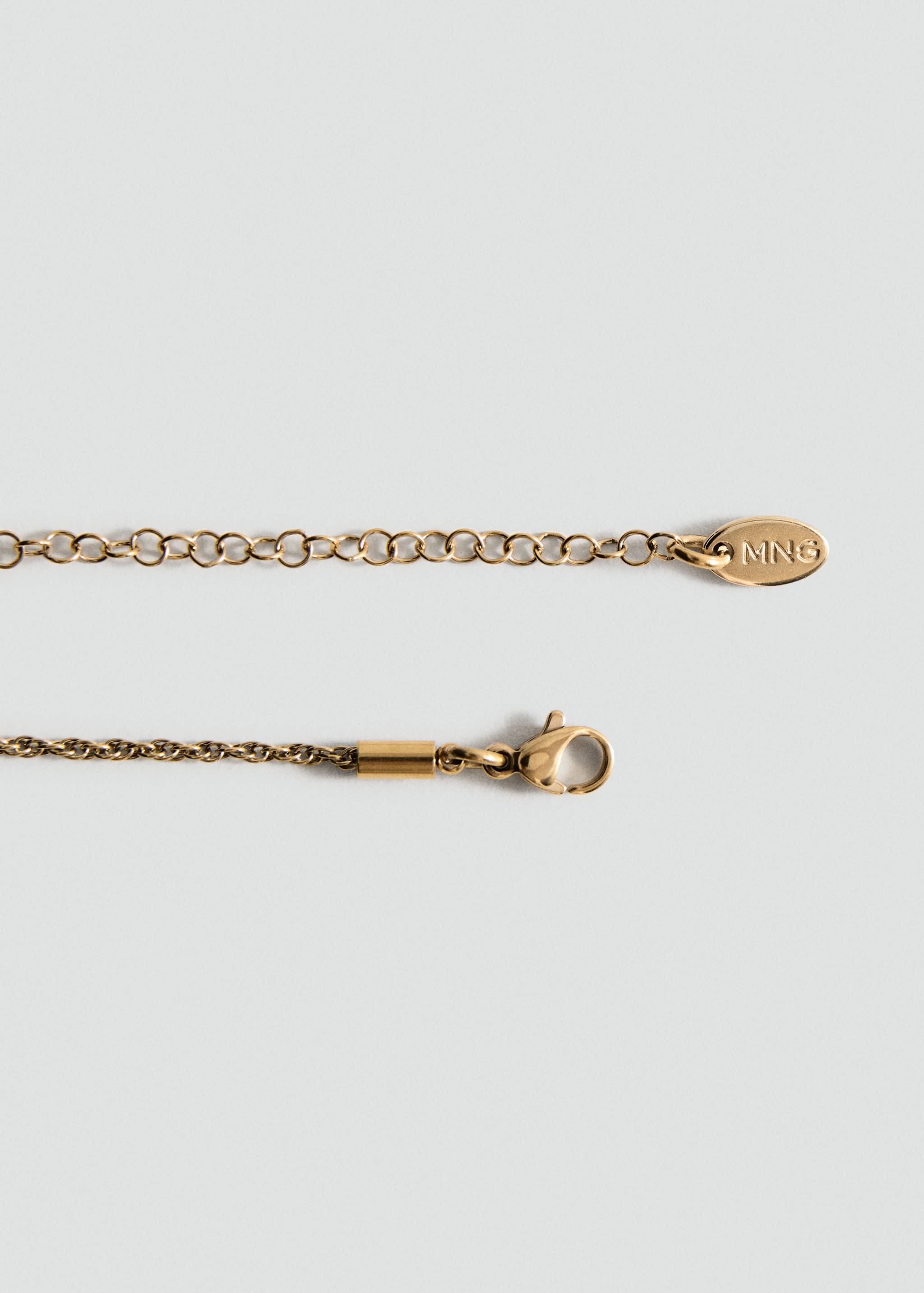 Collier créoles entrelacées en acier inoxydable - Détail de l'article 1