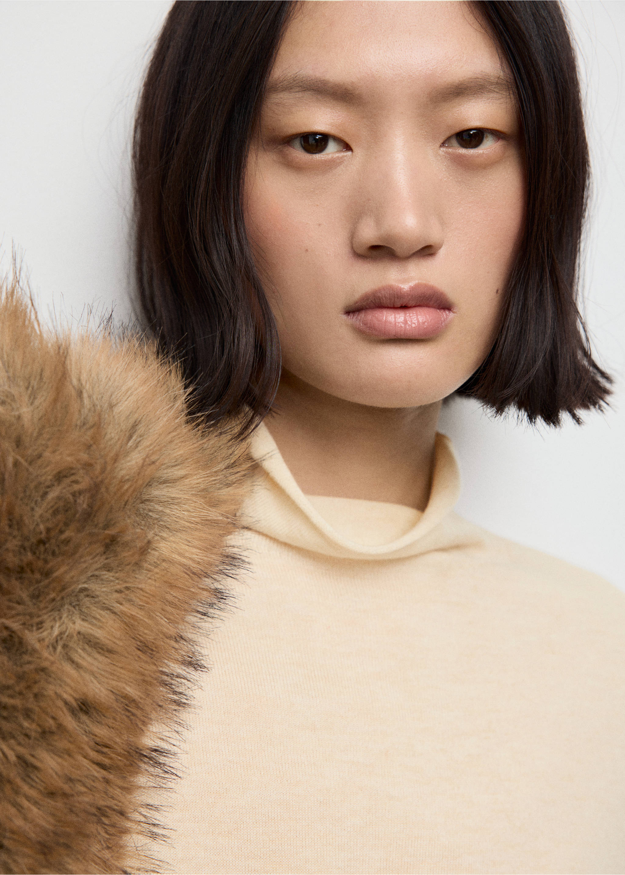 Cable-knit turtleneck sweater - Details of the article 1, Pastel Yellow. Ref: 17007819-00.