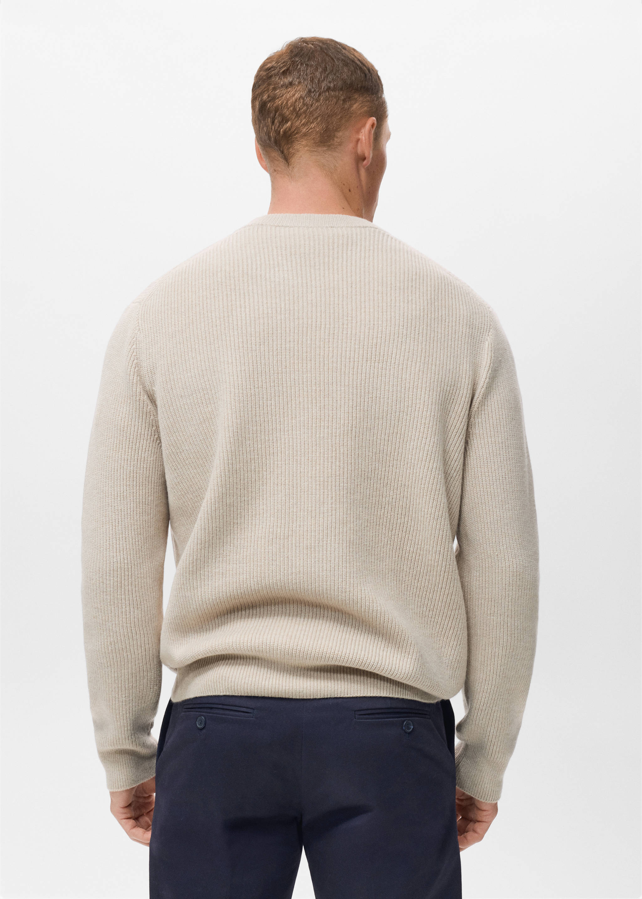 Knitted ribbed sweater - Reverse of the article
