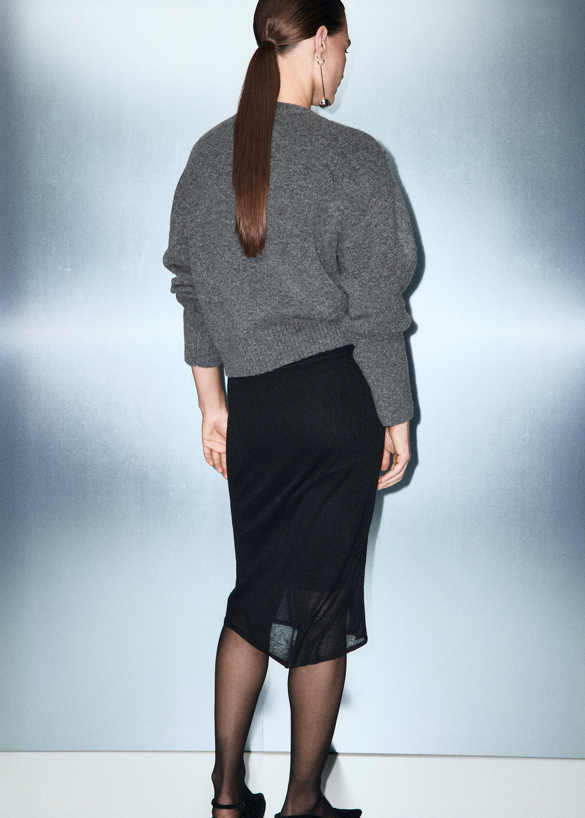 Knitted sweater with sequins - Reverse of the article