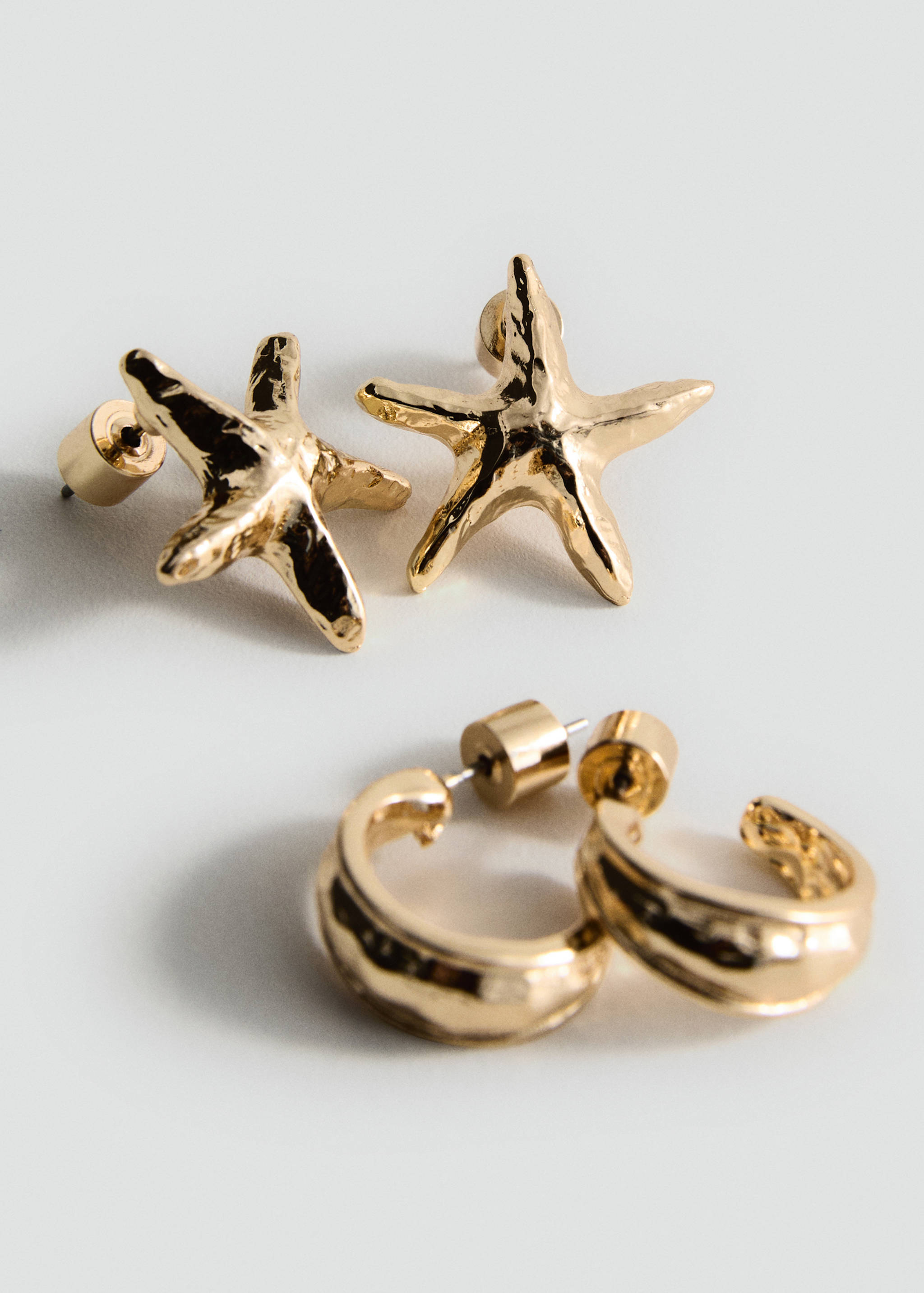 Conjunto de brincos com textura combinada - Plano médio