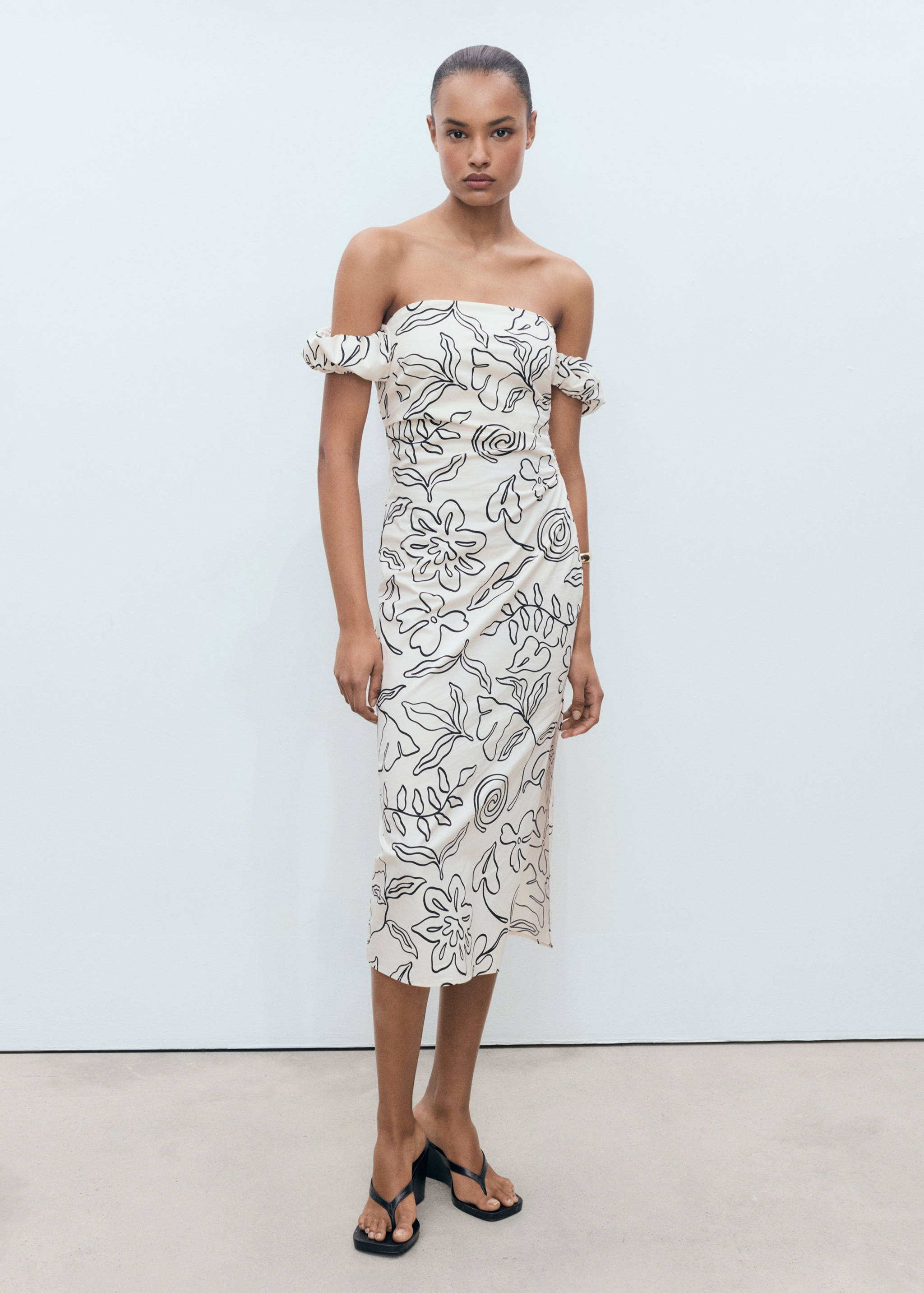 ชุดเดรสลายดอกไม้แบบเกาะอก - เครื่องบินทั่วไป