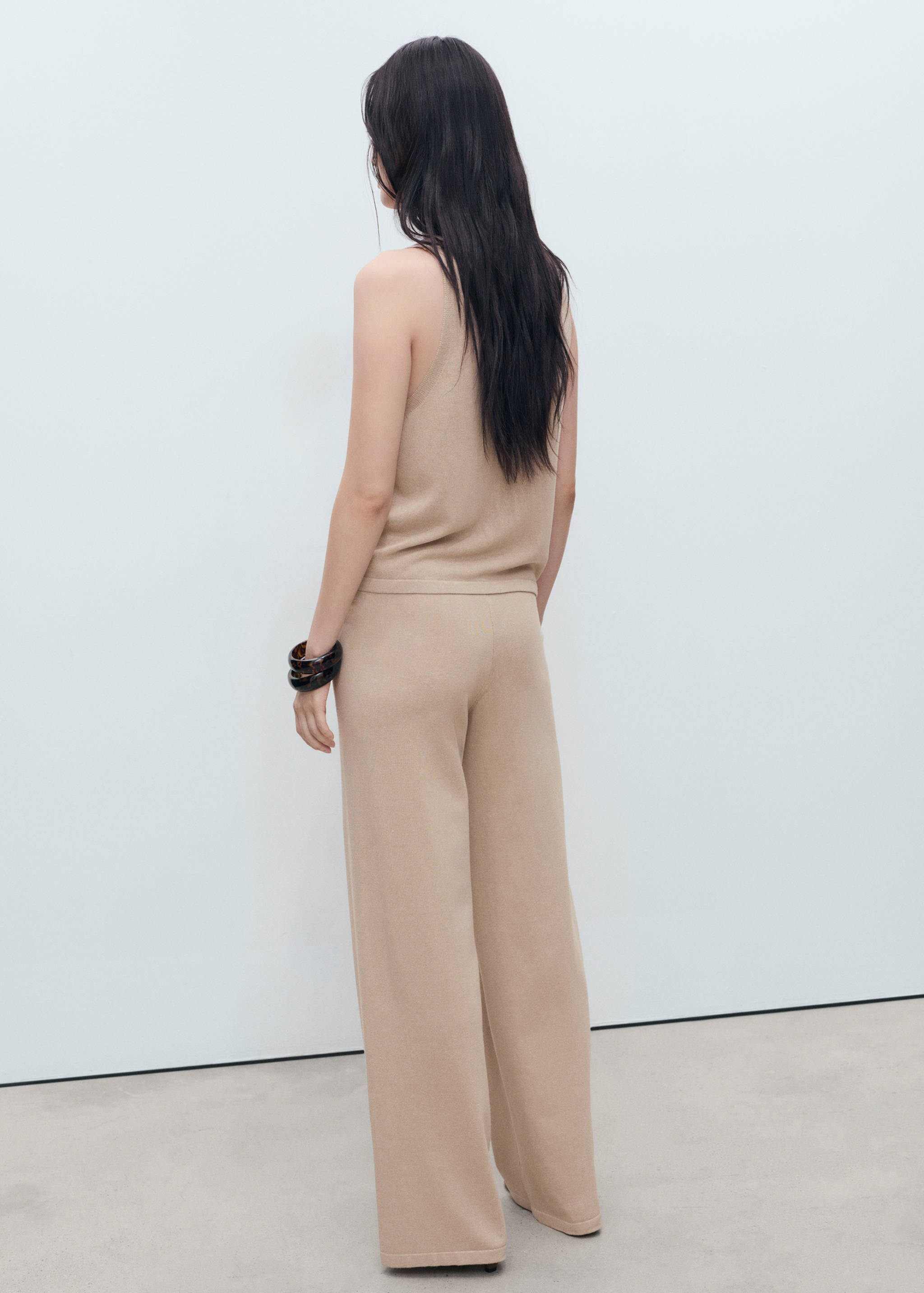 Top de malha com gola em V - Verso do artigo