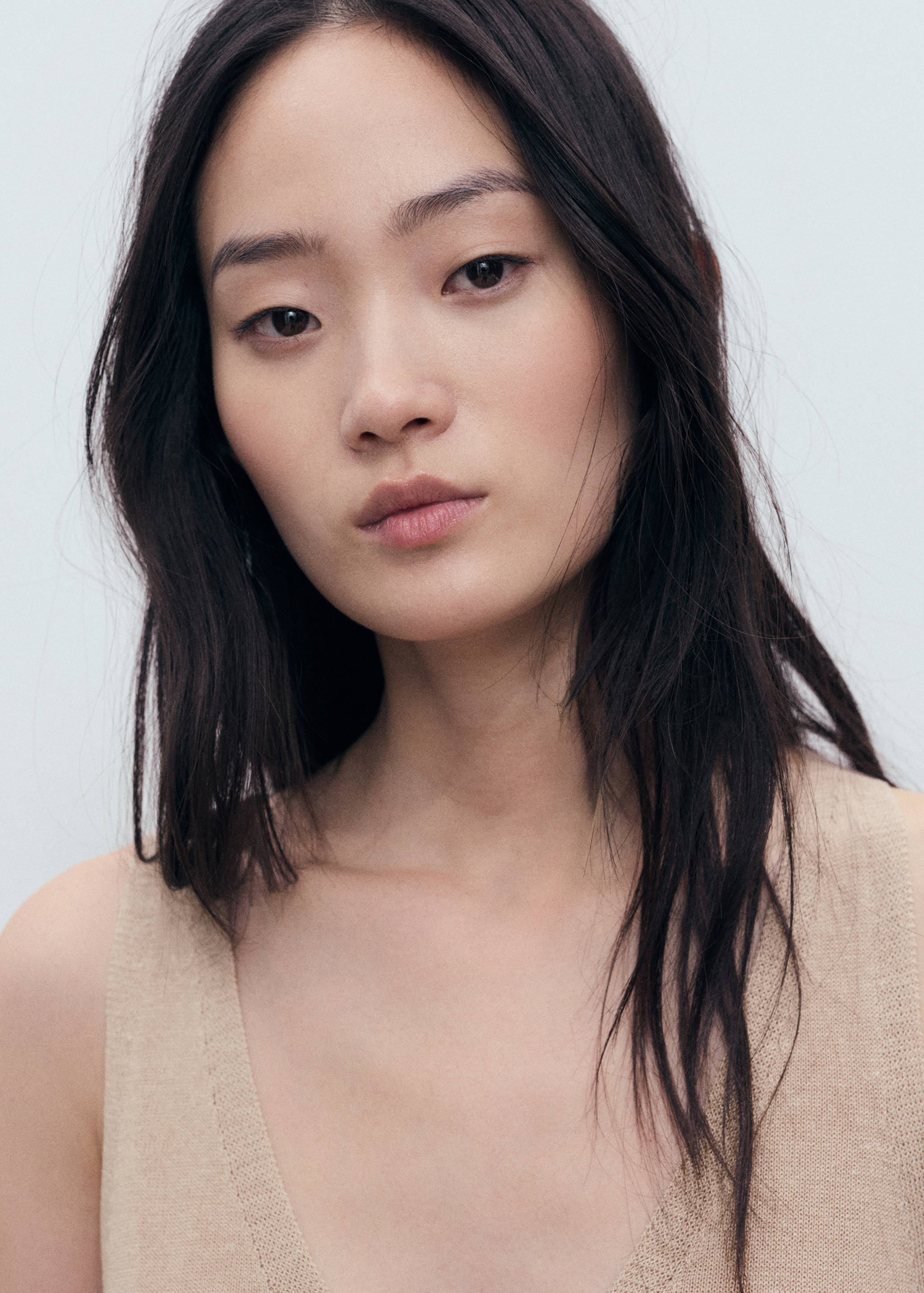 Top de malha com gola em V - Pormenor do artigo 1