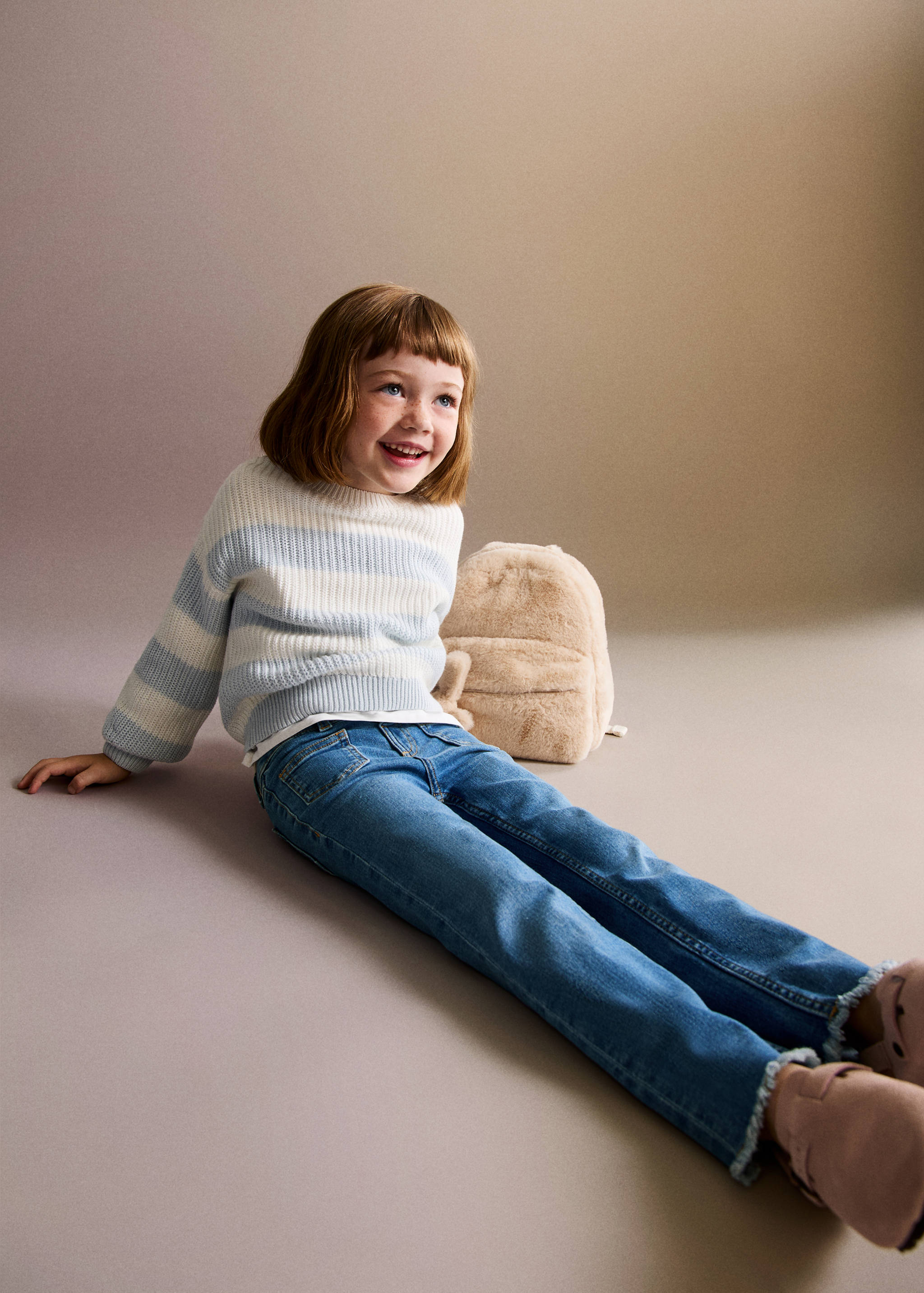 Jeans flare bordo sfilacciato - Piano medio