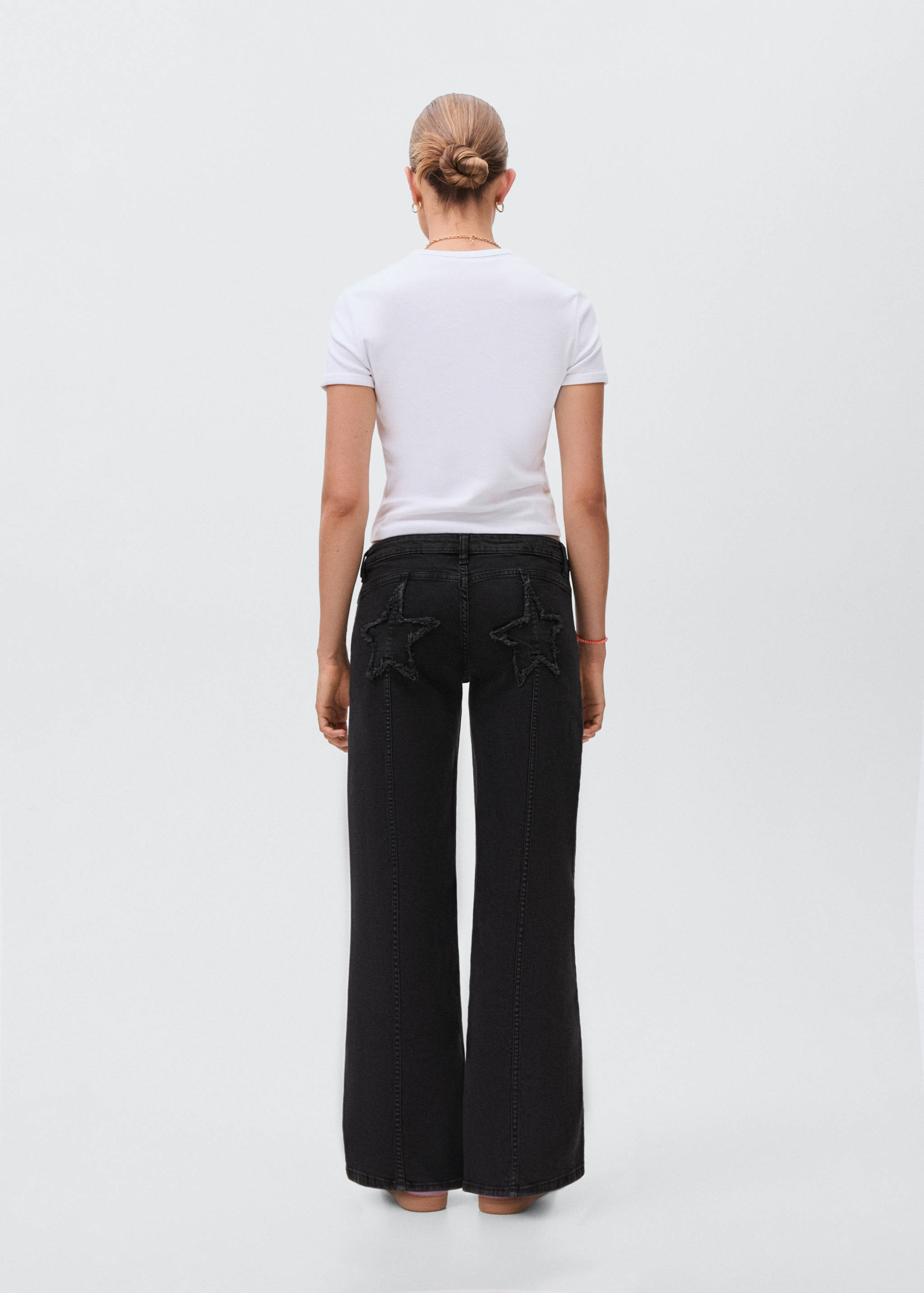 Straight jeans with stars - Reverse of the article