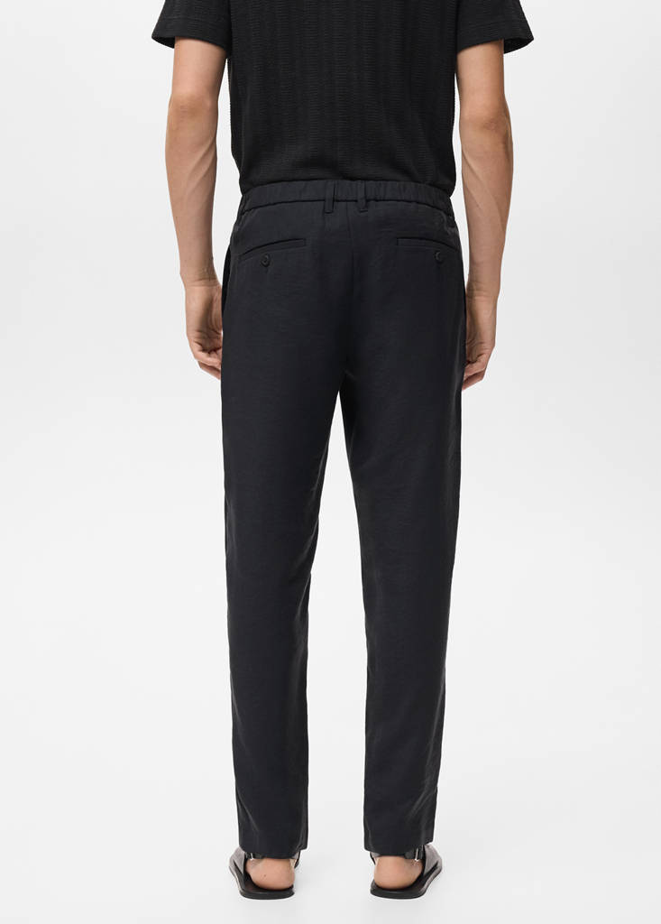 Straight-fit pleated trousers — Black
