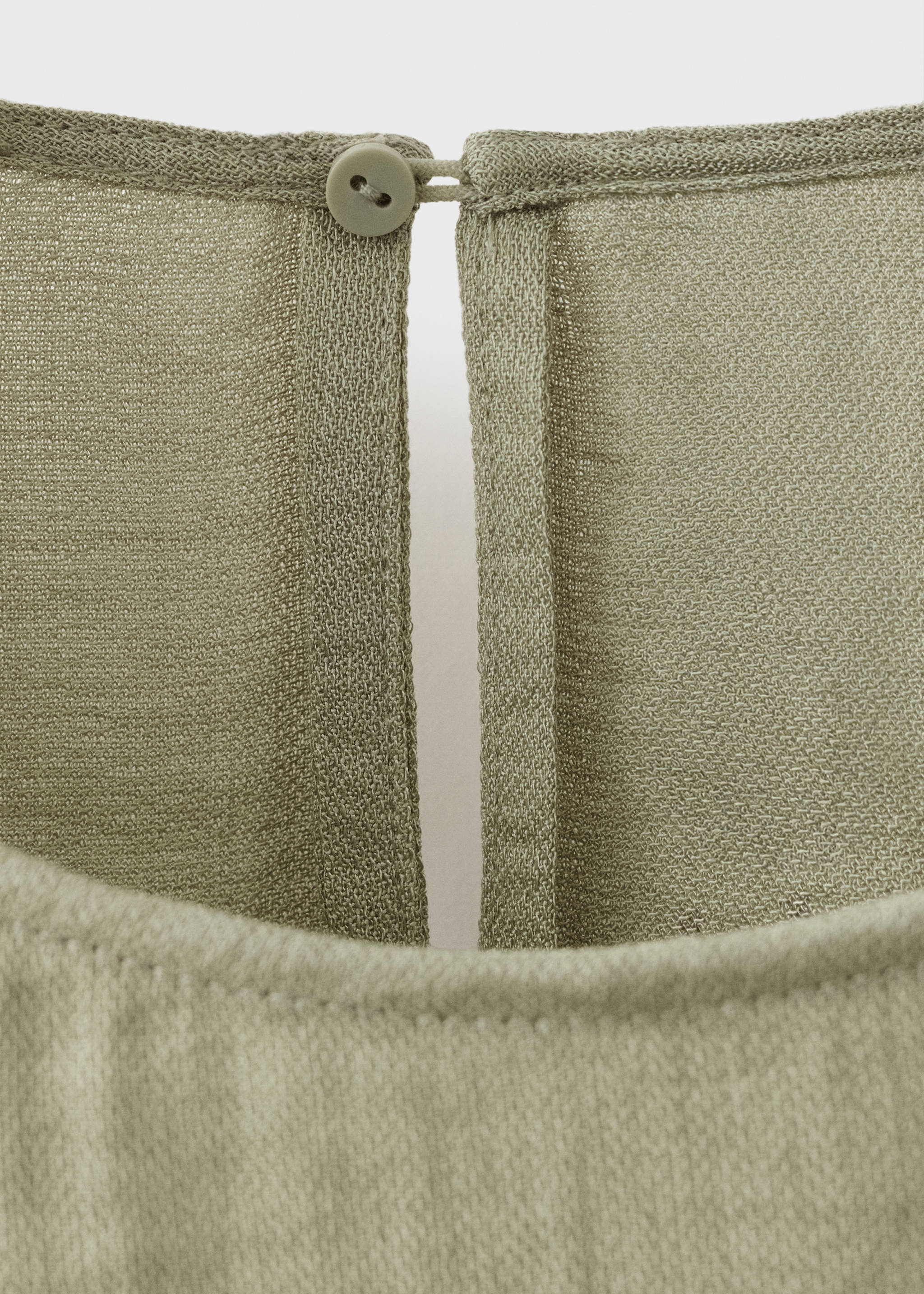 Блузка оверсайз с подвернутыми рукавами - Деталь изделия 0