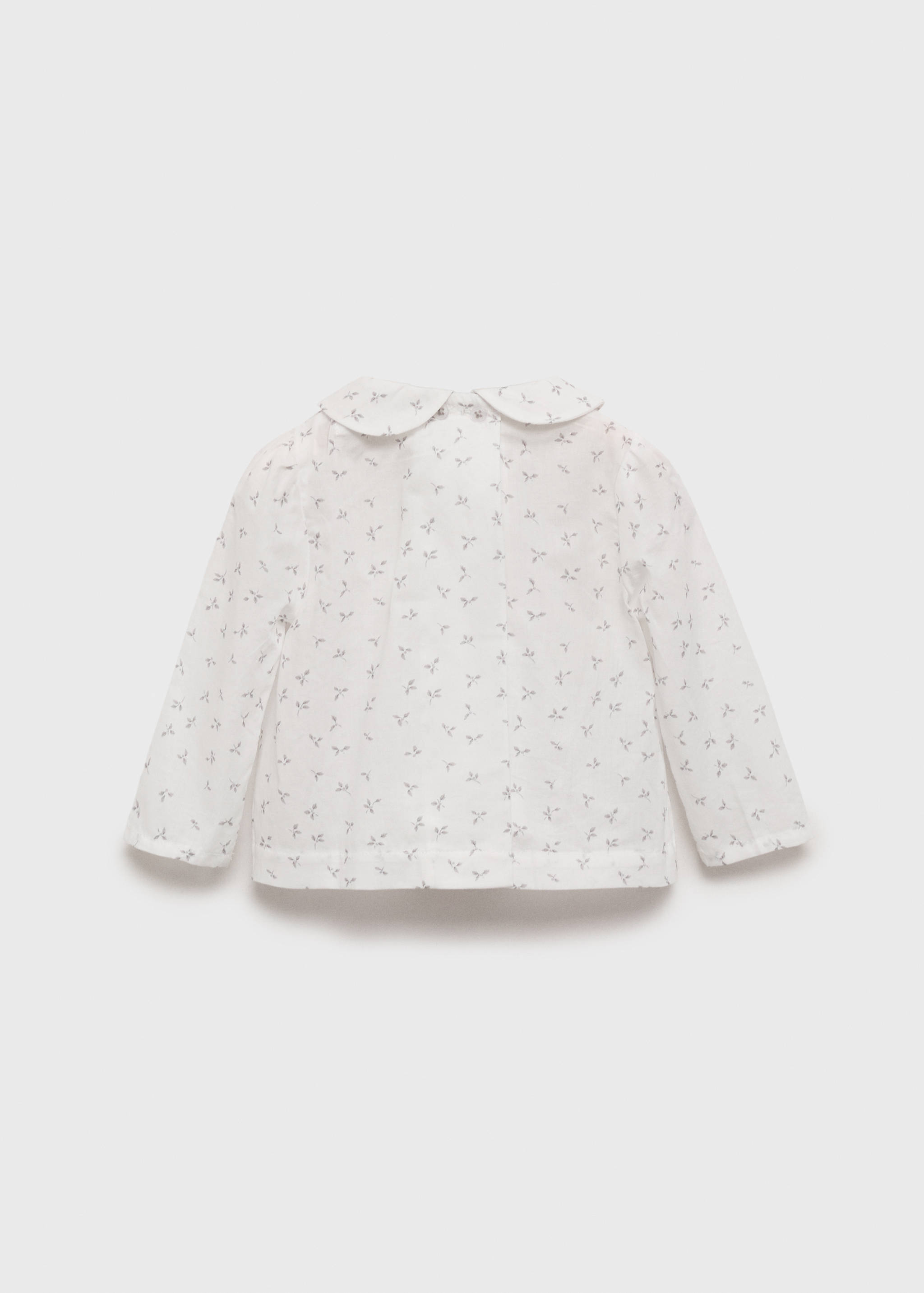 بلوزة مطبوعة بها أزهار - الجهة الخلفية للمنتج