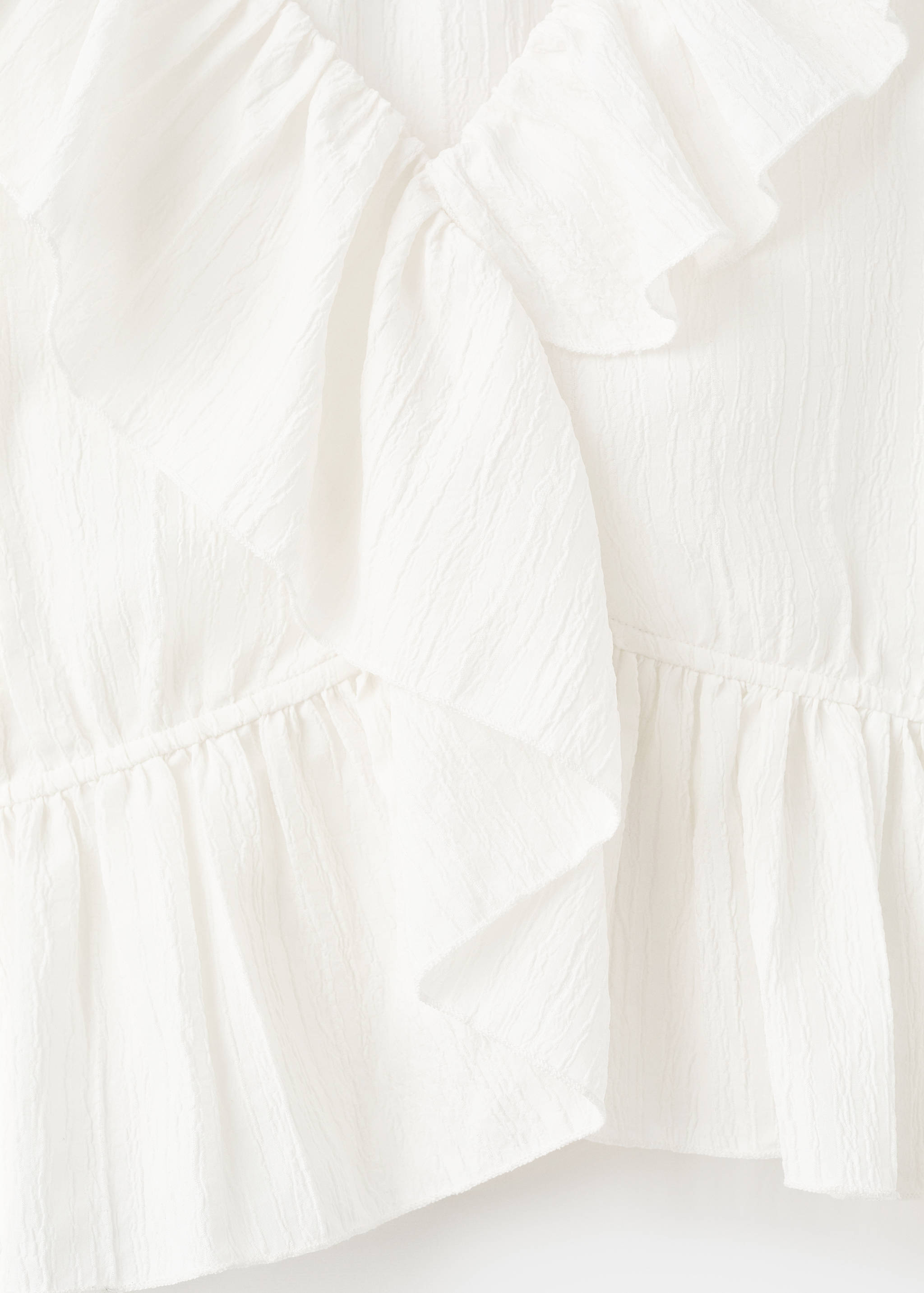 Blusa cruzada de folhos - Pormenor do artigo 8