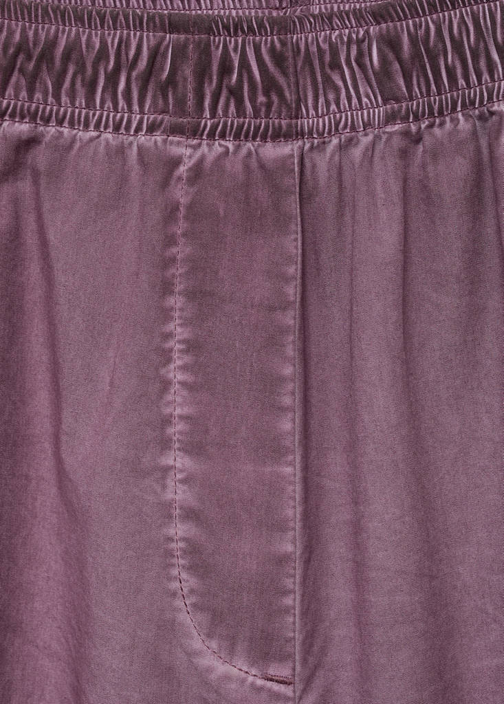 Garment-dyed cotton long trousers — Plum