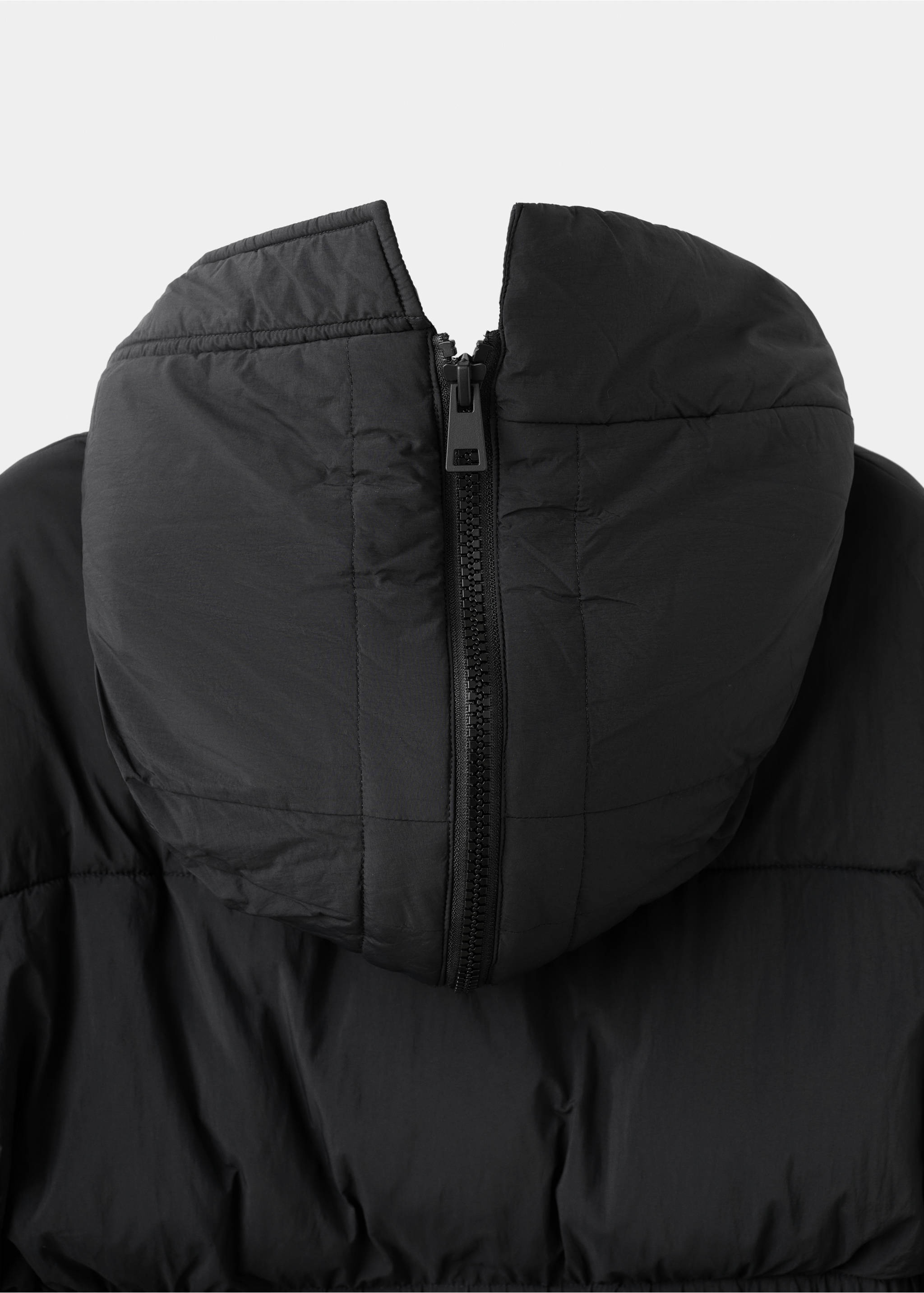Fitted quilted anorak with hood - Details of the article 0, Black. Ref: 17017766-00.