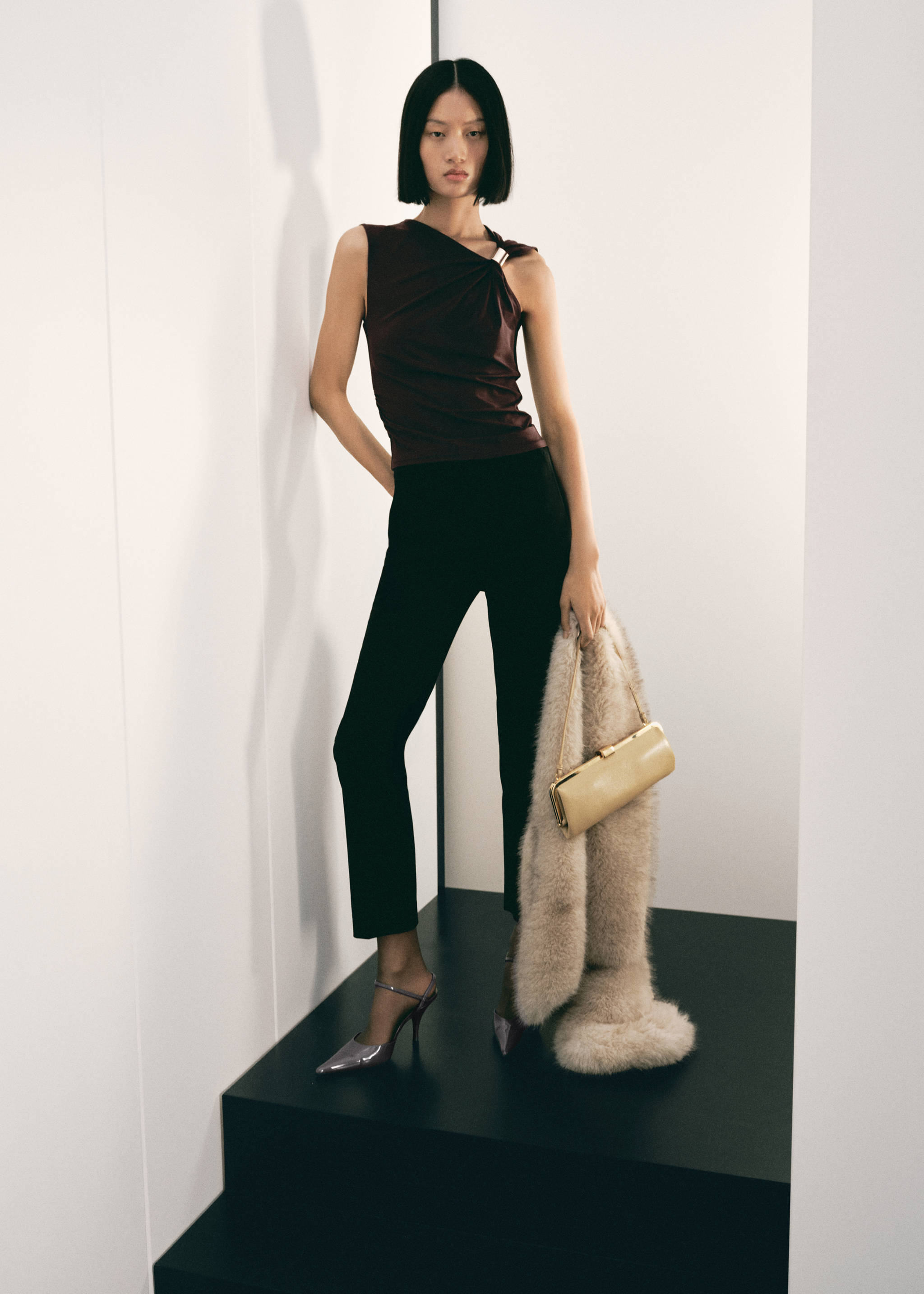 Top with asymmetrical neckline and metallic detail - General plane