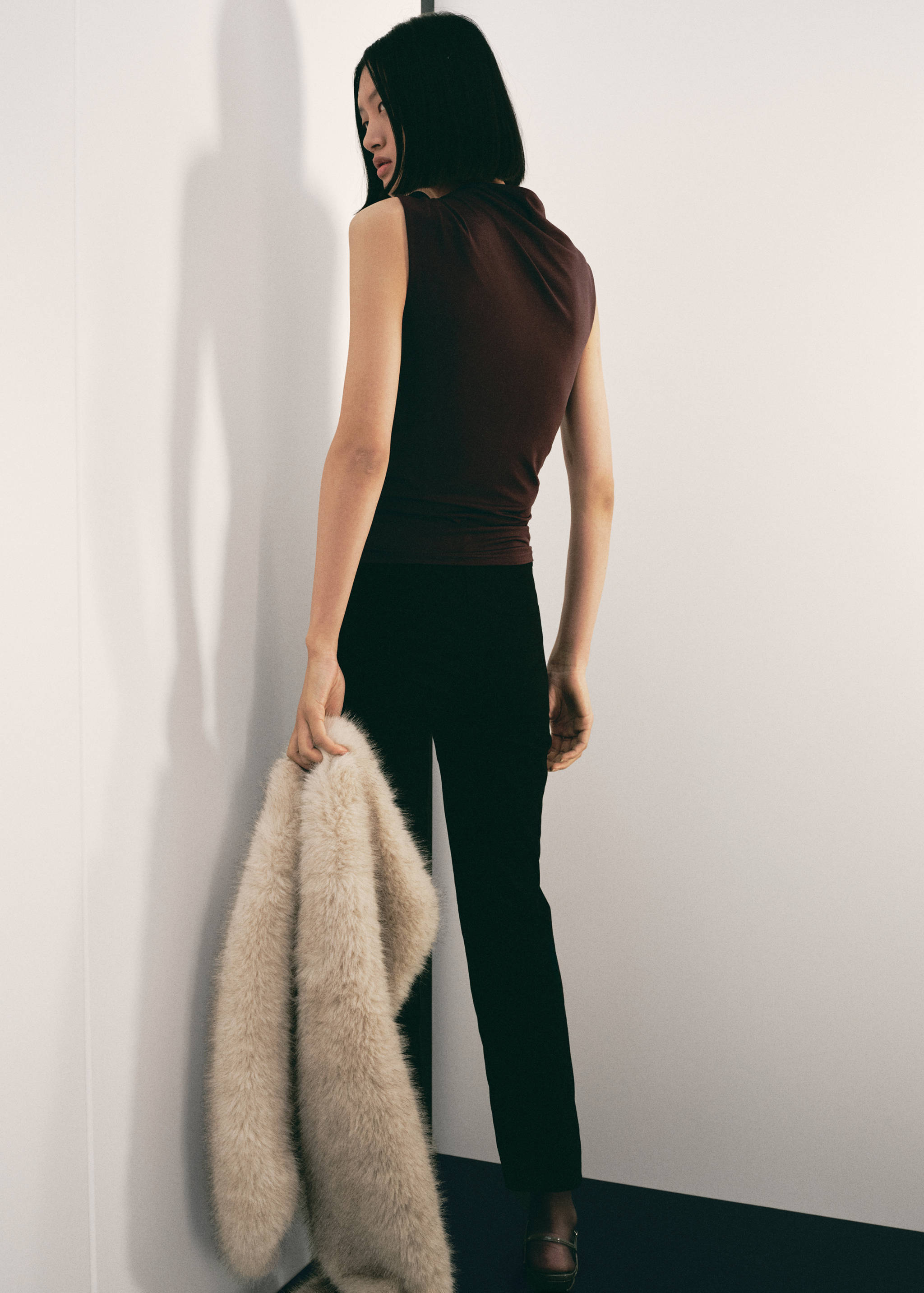 Top with asymmetrical neckline and metallic detail - Reverse of the article