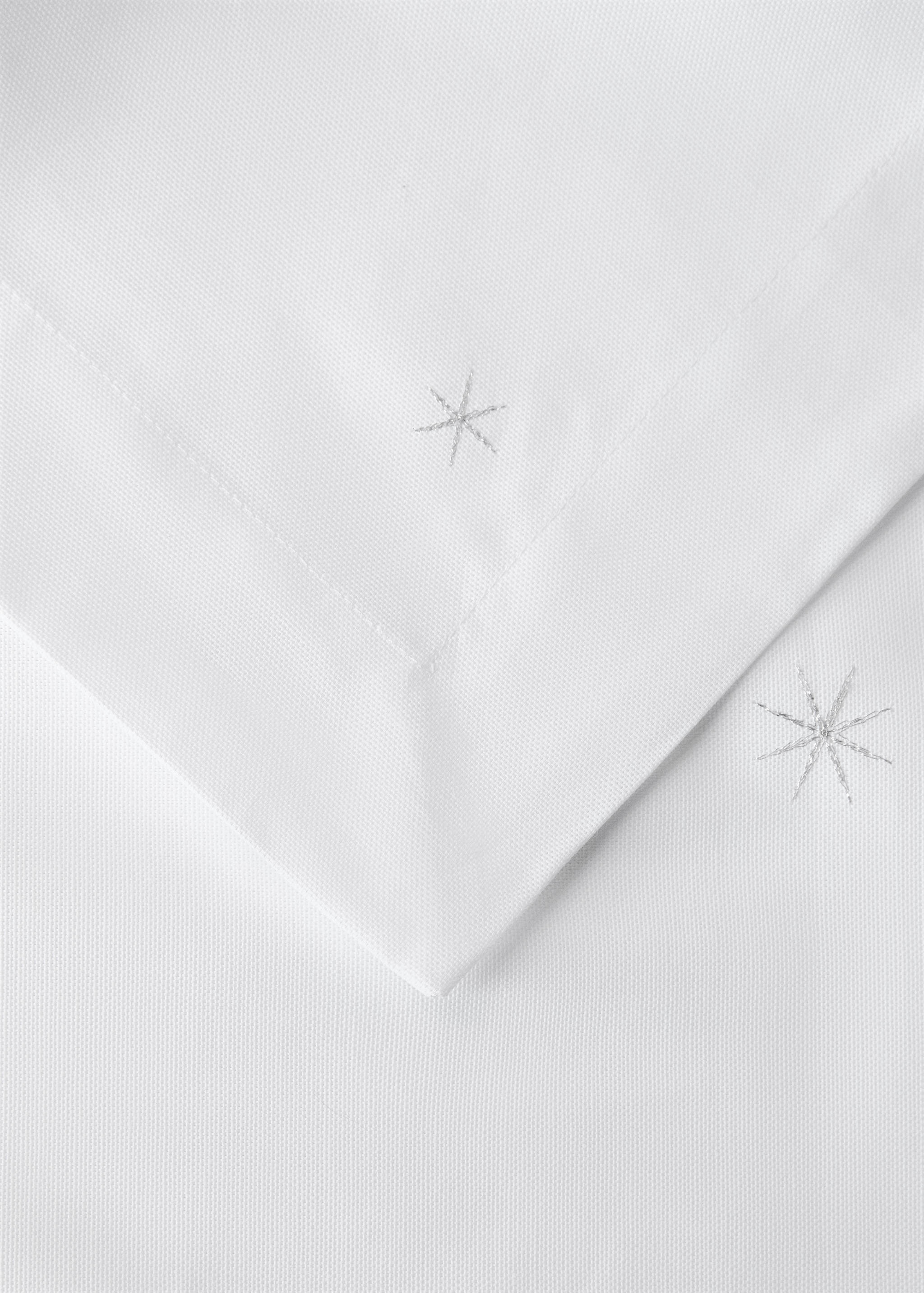 100% cotton tablecloth with embroidered star details for 2 to 4 diners - Details of the article 1