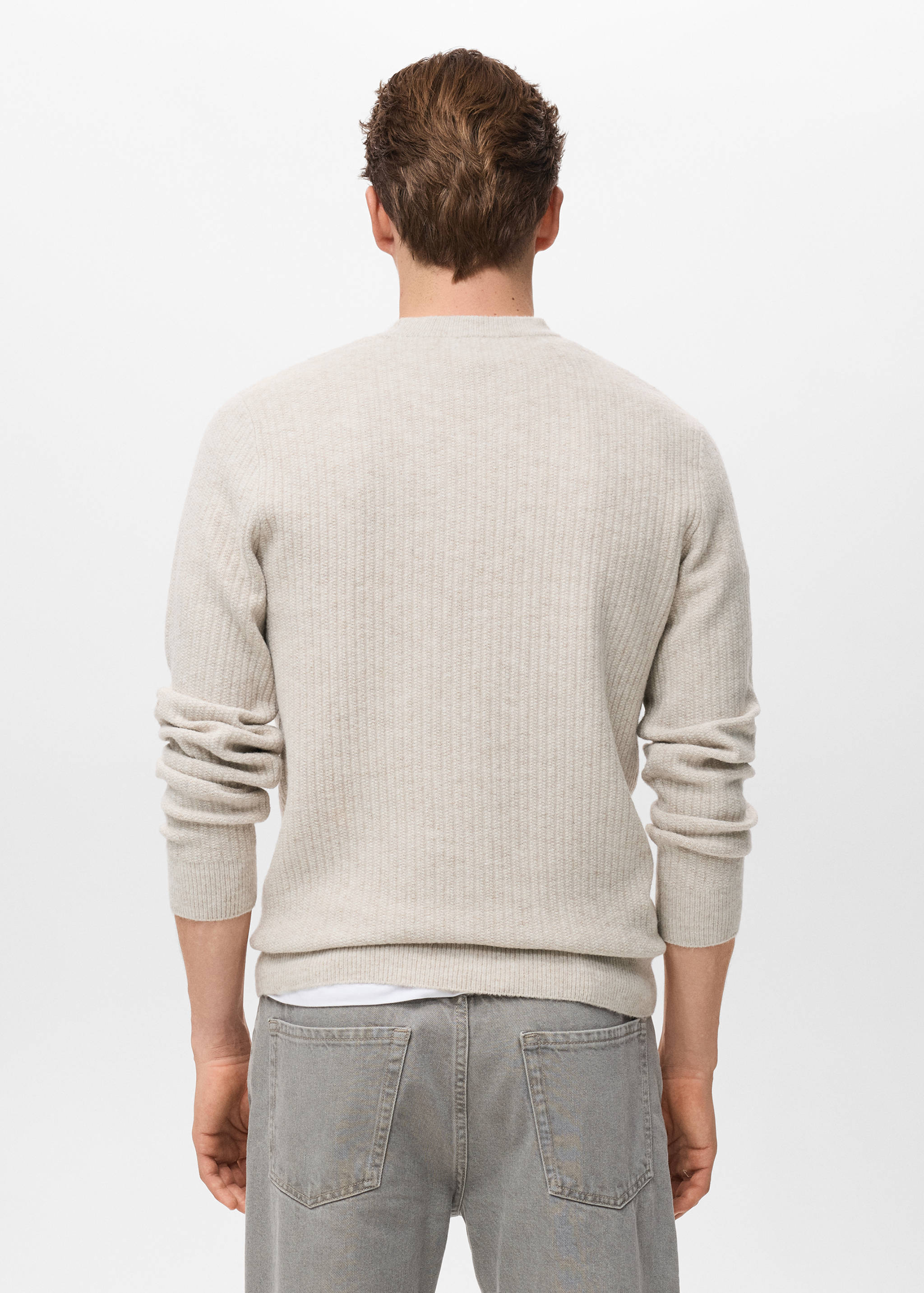 Knitted ribbed sweater - Reverse of the article