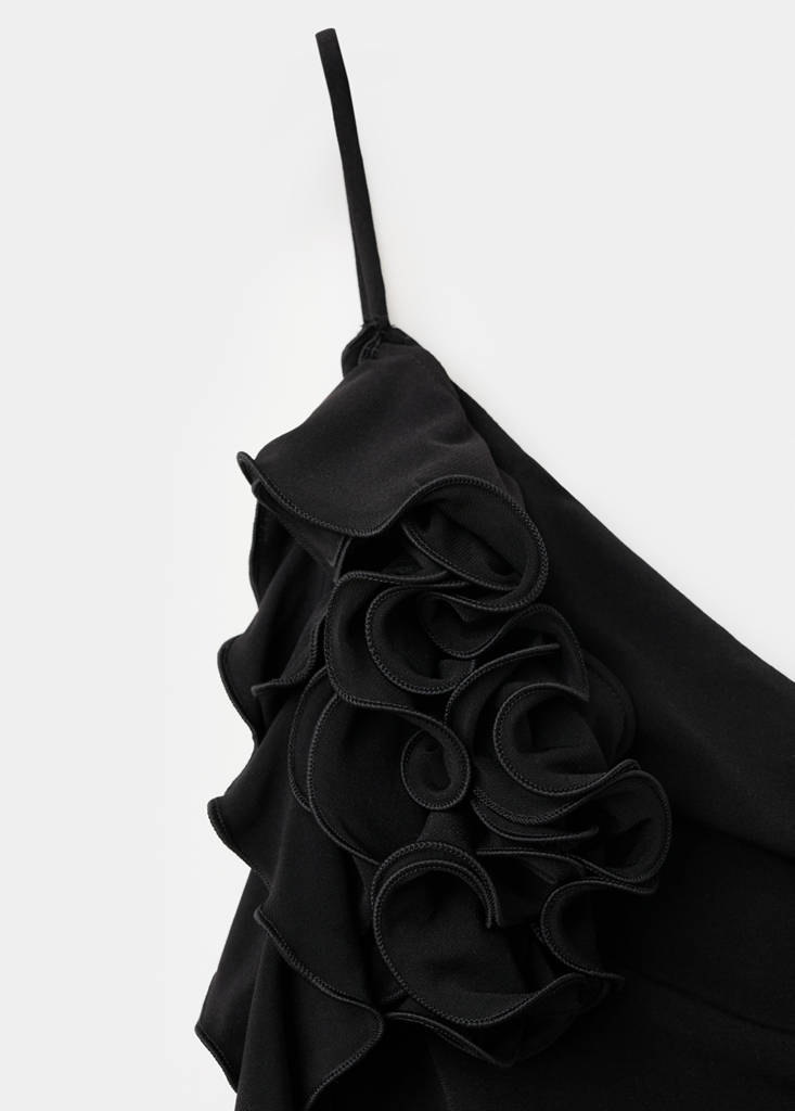Ruched asymmetrical top with ruffle trim — Black