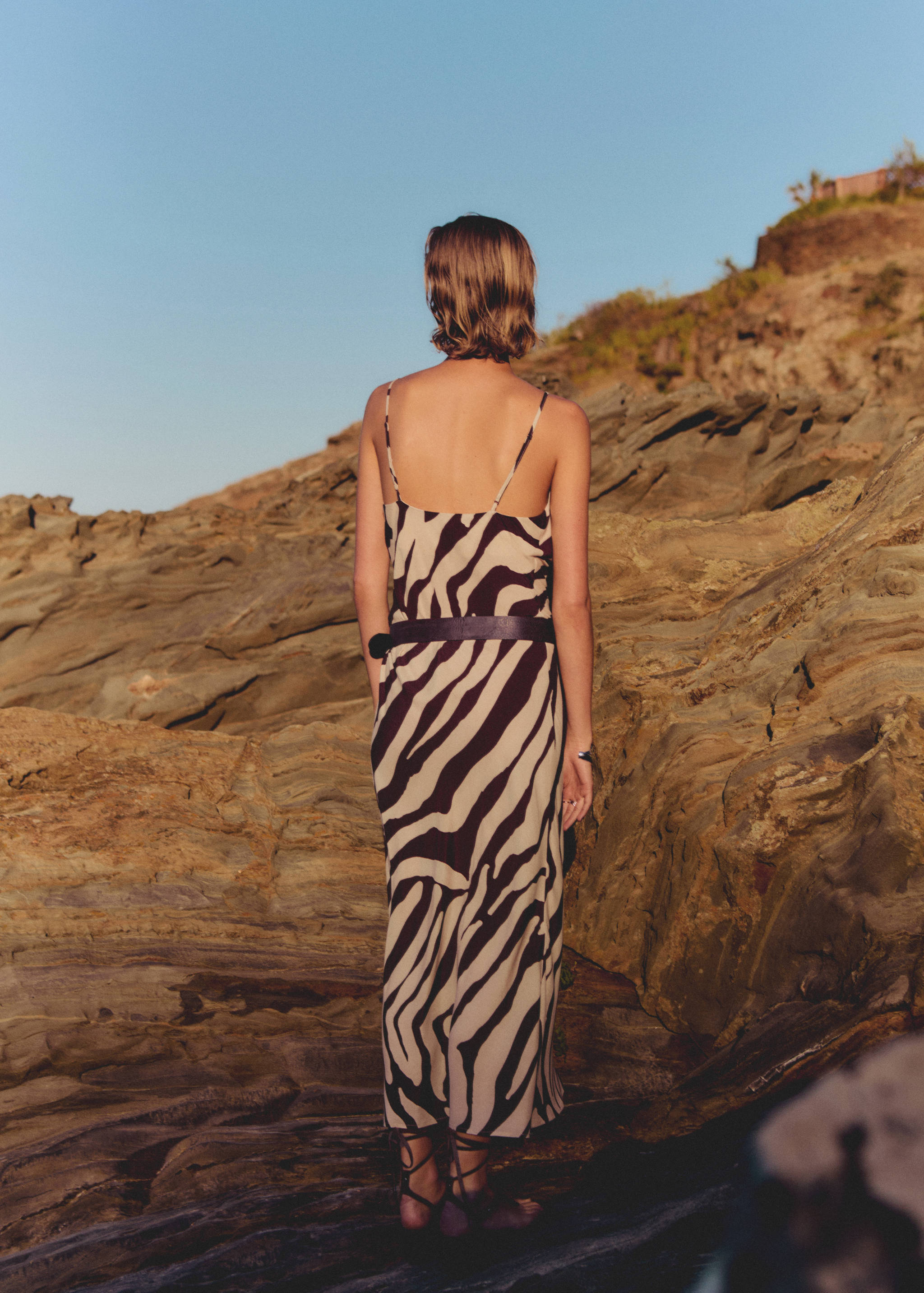 Zebra-print dress with draped neckline - Reverse of the article