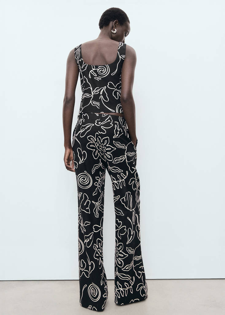 Floral-print linen-blend trousers — Black