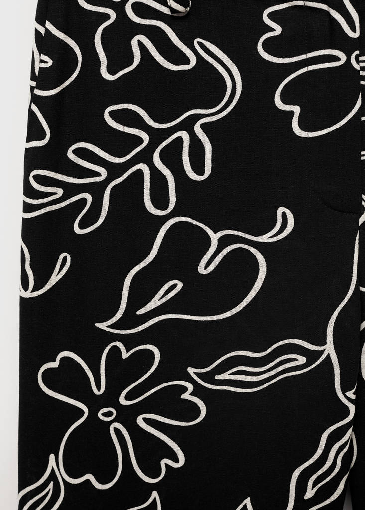 Floral-print linen-blend trousers — Black