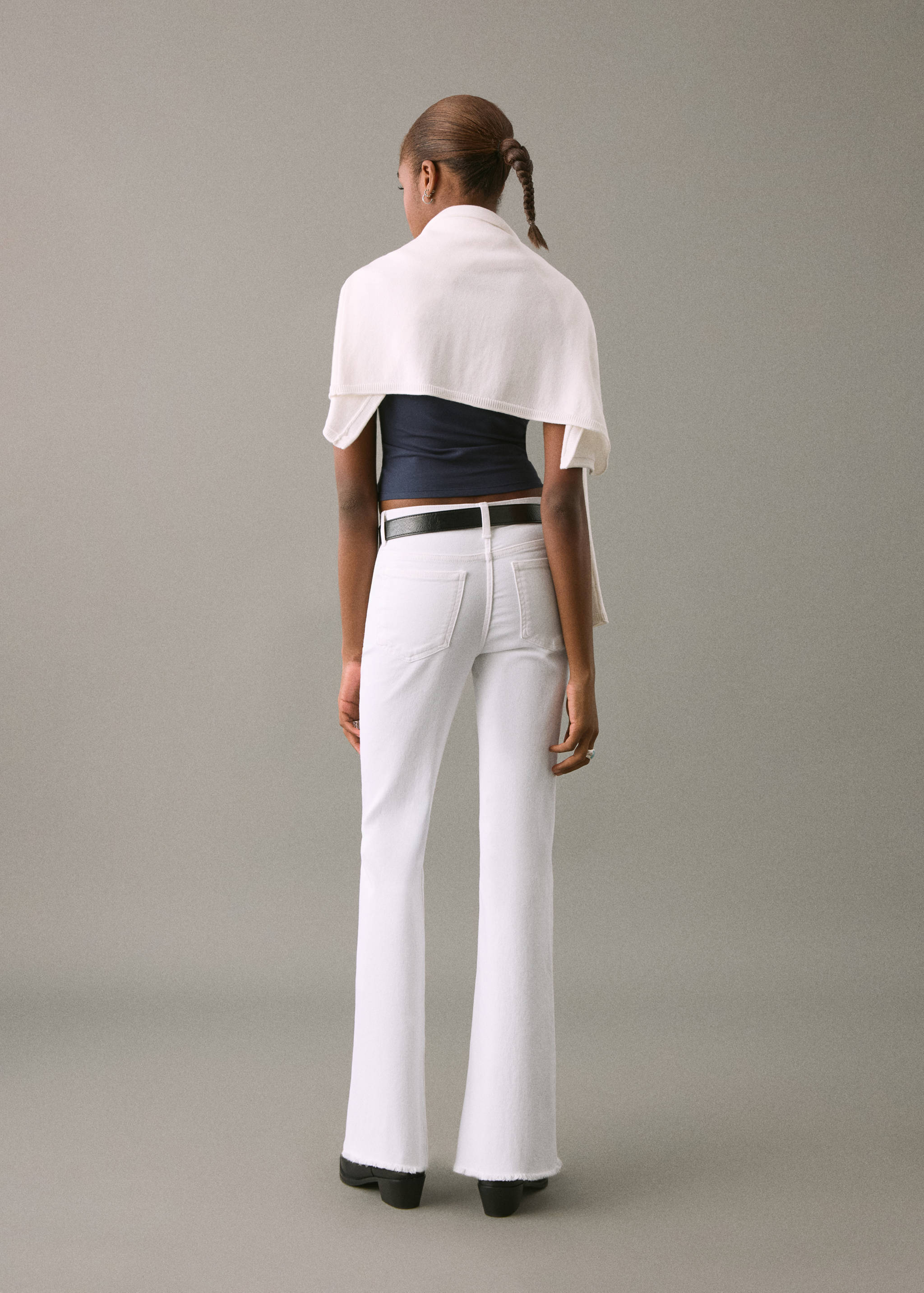 Flared jeans with studs - Reverse of the article