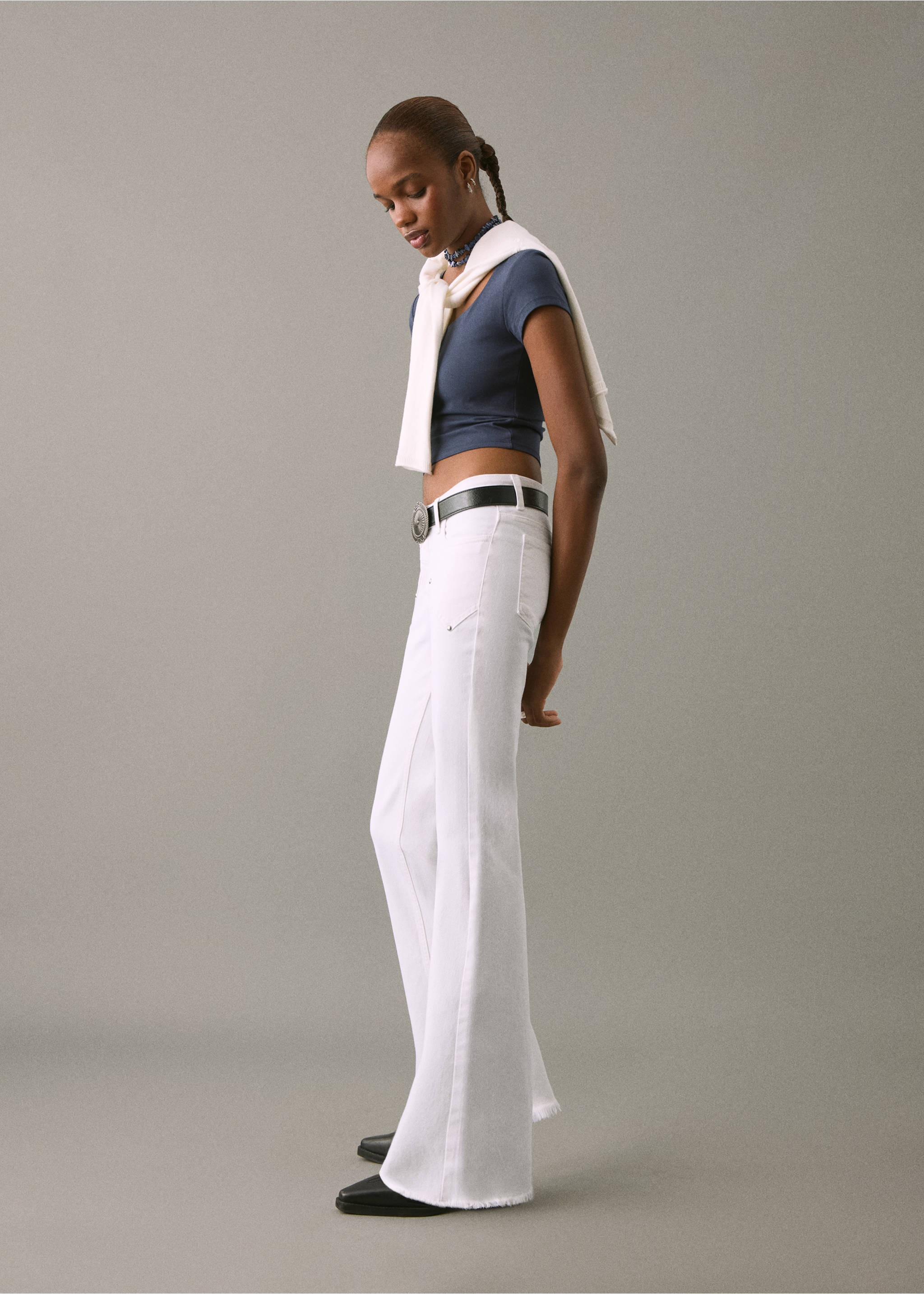 Flared jeans with studs - Details of the article 2, Off White. Ref: 17021184-00.