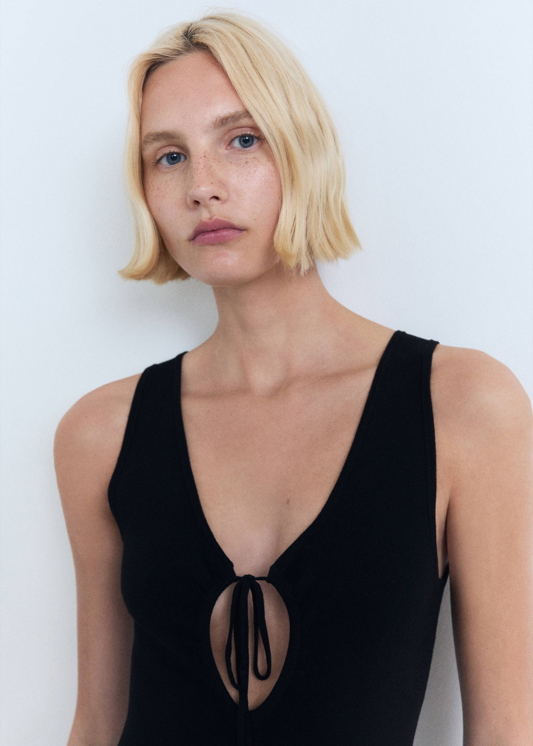 Knitted dress with bow neckline - Details of the article 1