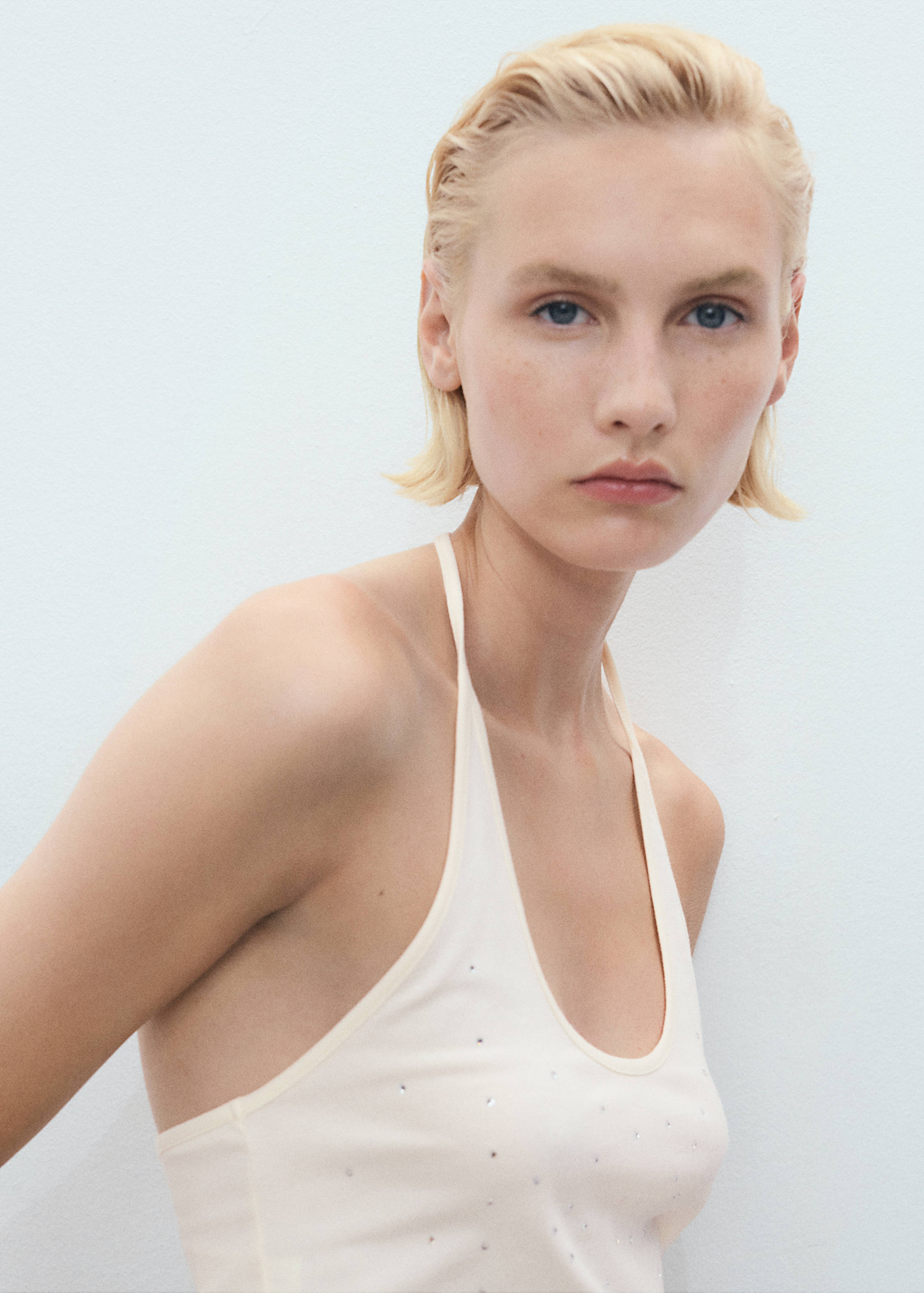 Halter neck top with metallic appliqués - Details of the article 1