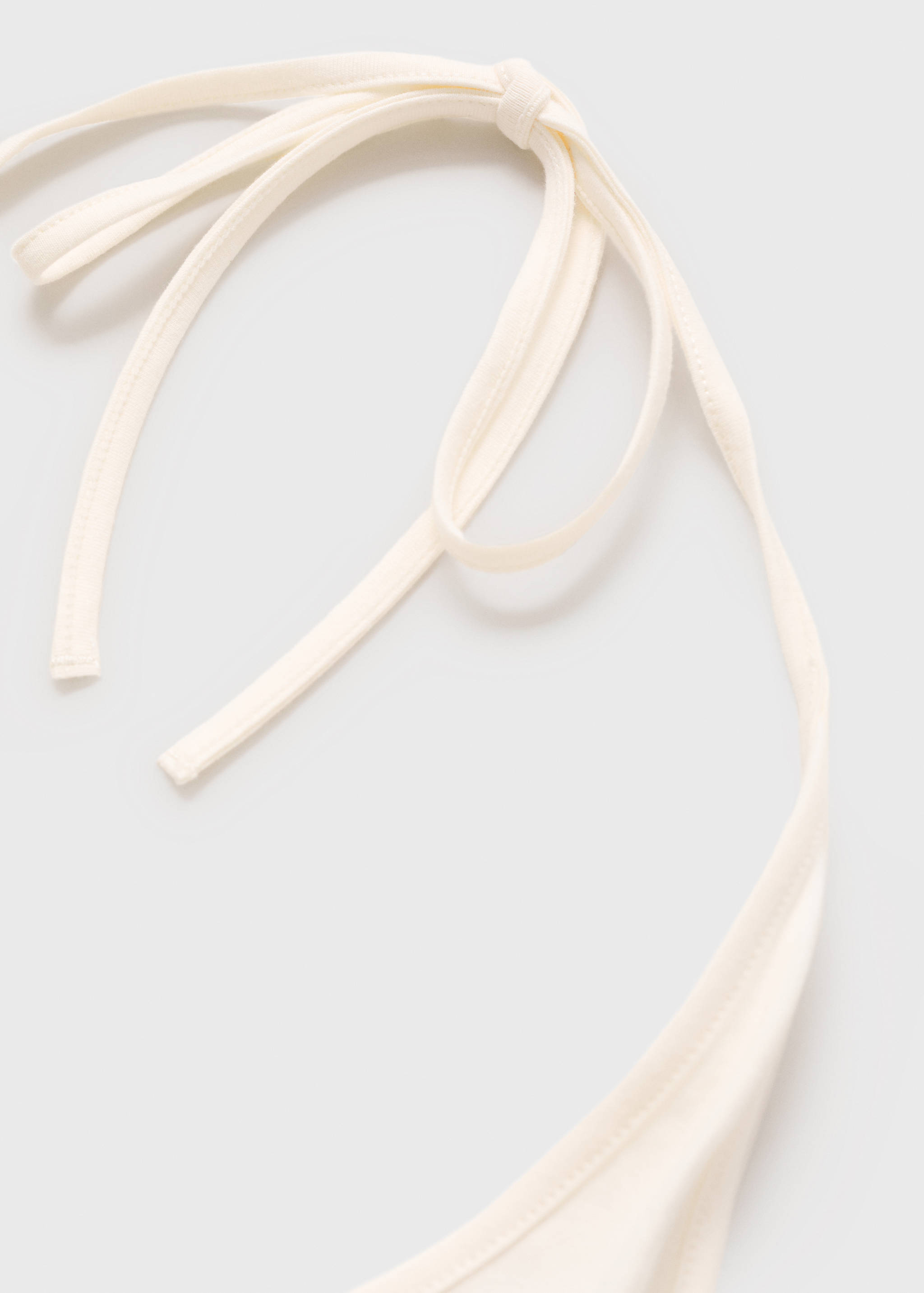 Halter neck top with metallic appliqués - Details of the article 0