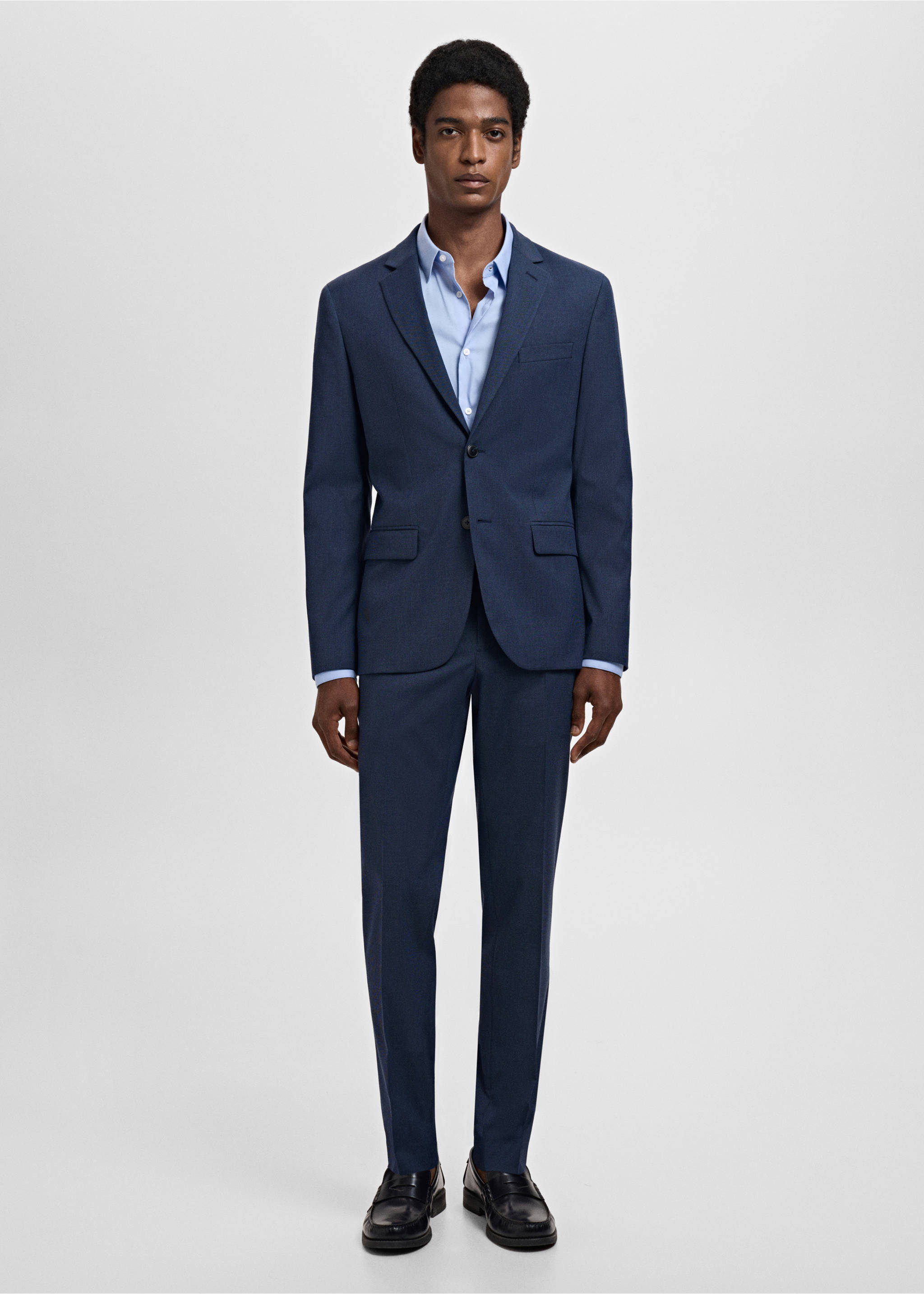 Navy blue suit trousers styled with a matching blazer and light blue shirt., Ink Blue. Ref: 17021237-00.