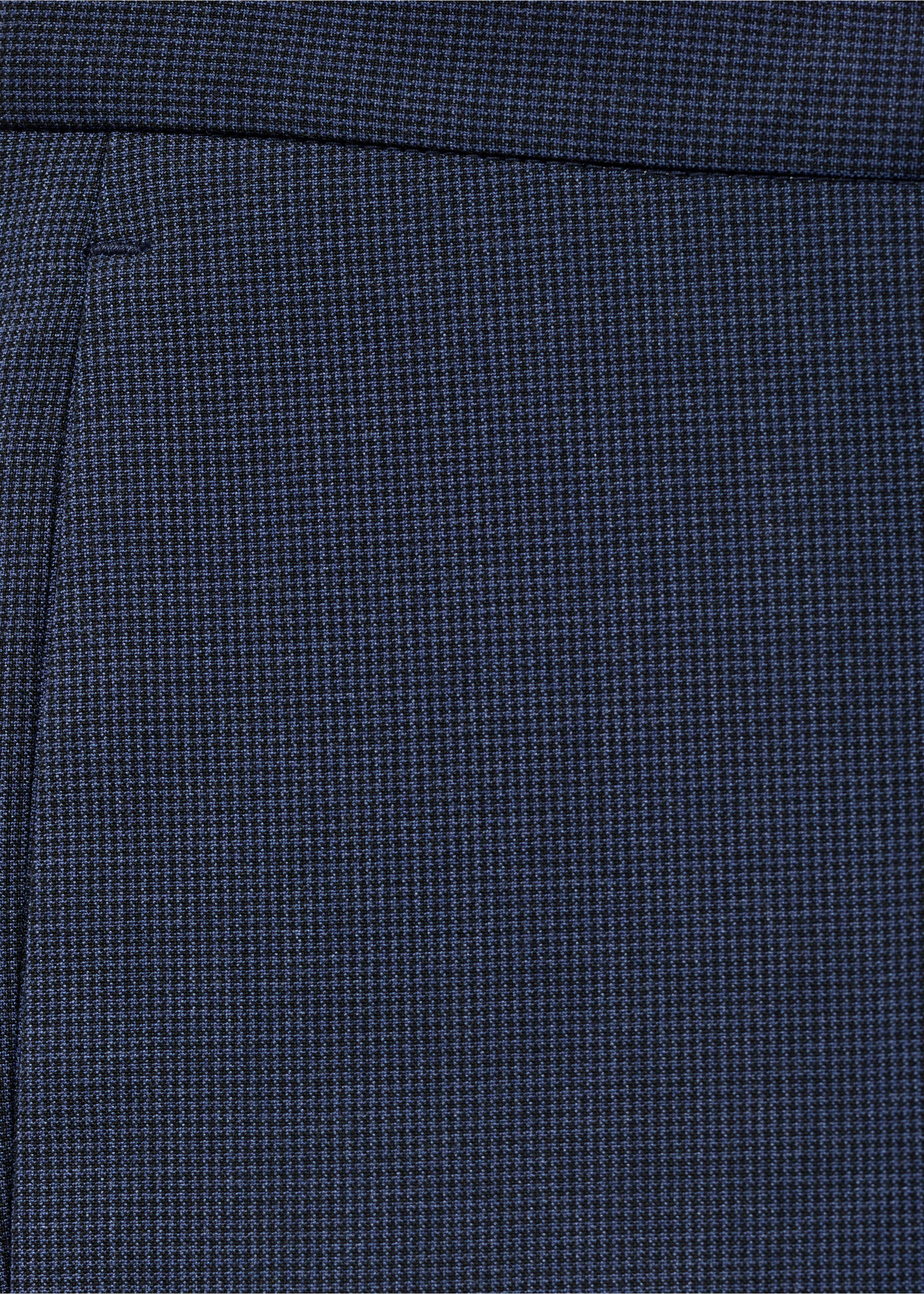 Close-up of navy blue trousers showing the textured fabric., Ink Blue. Ref: 17021237-00.
