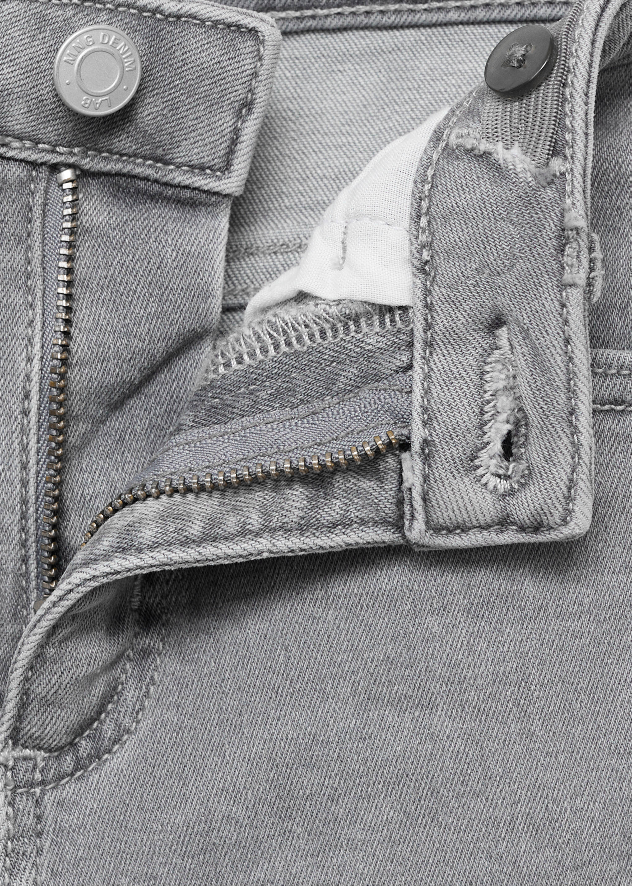 Jean flare ourlet effiloché - Détail de l'article 8, Gris denim. Ref: 17021243-00.