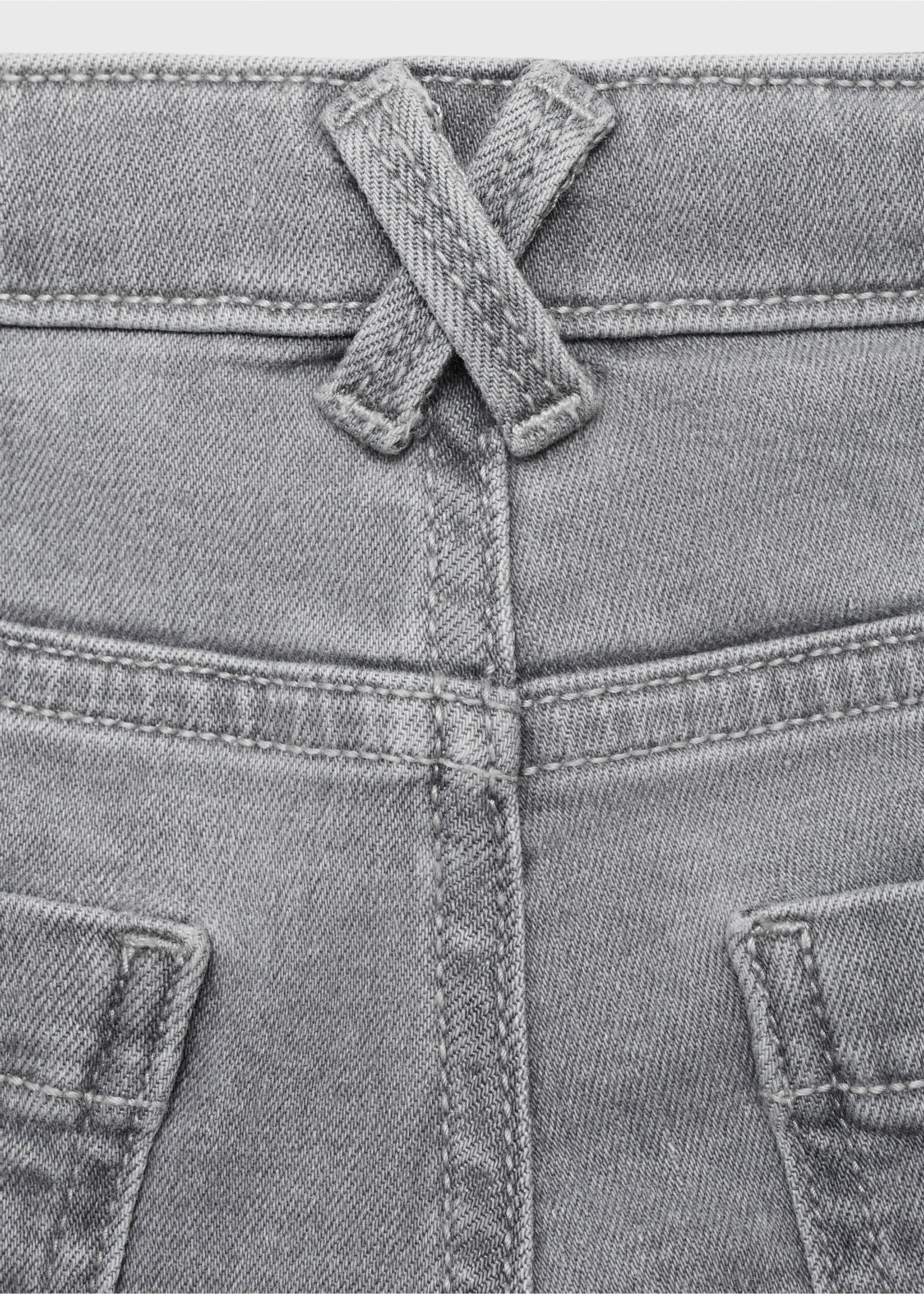 Jean flare ourlet effiloché - Détail de l'article 0, Gris denim. Ref: 17021243-00.