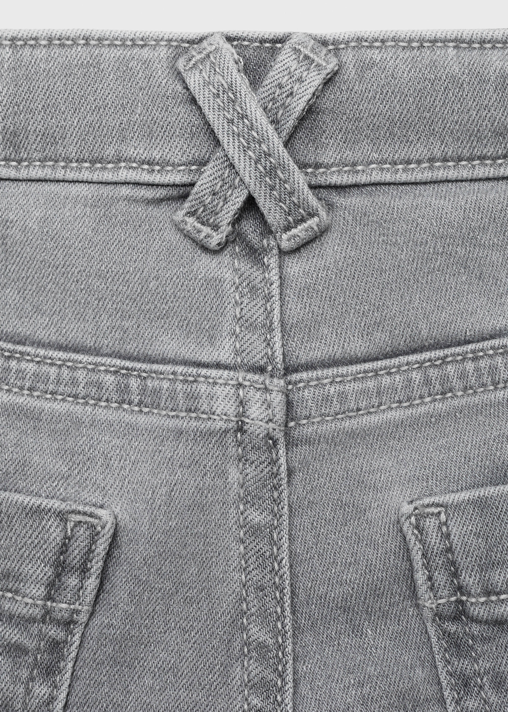 Frayed low-rise skinny jeans - Details of the article 0