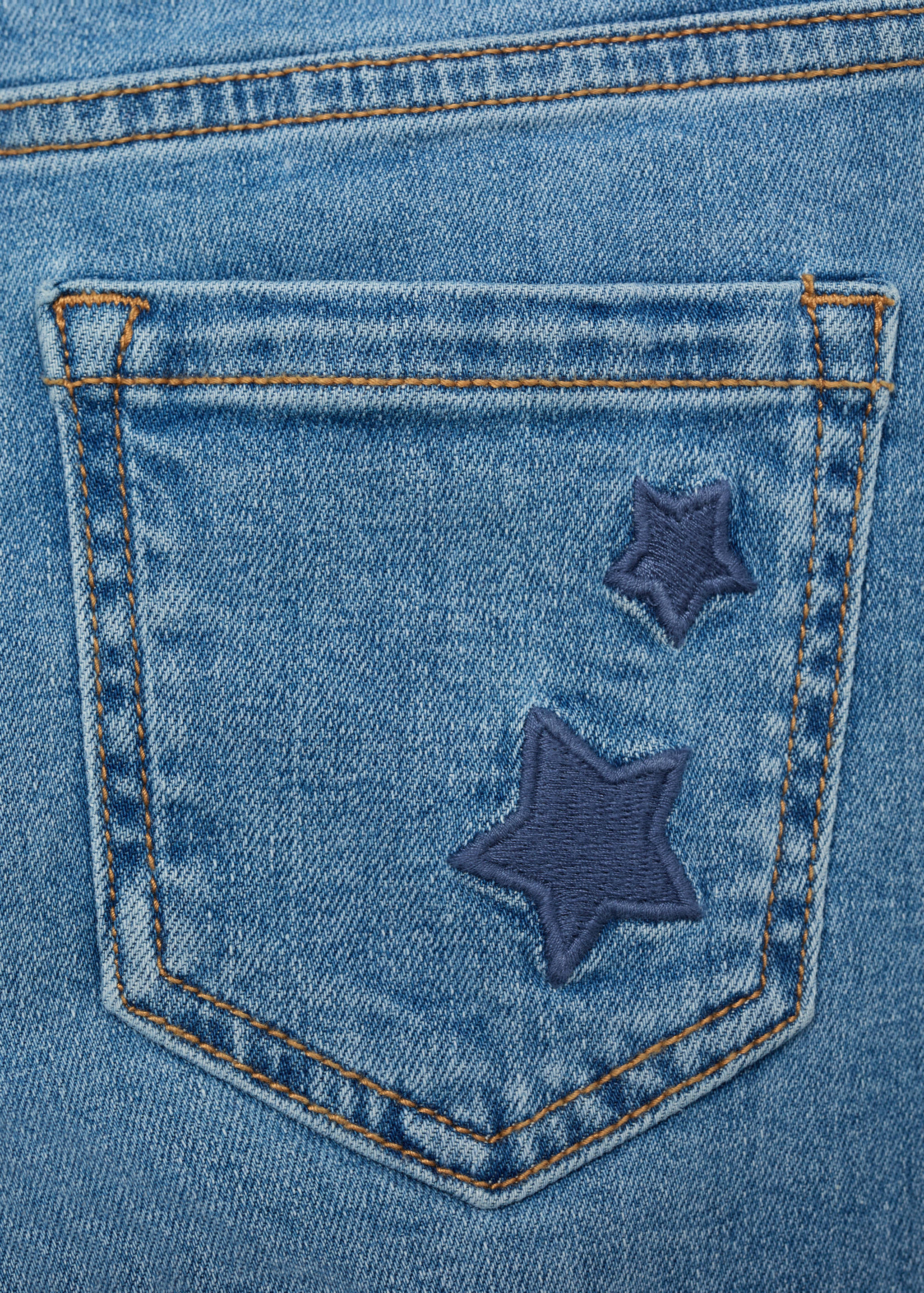 Star-embroidered skinny jeans - Details of the article 0