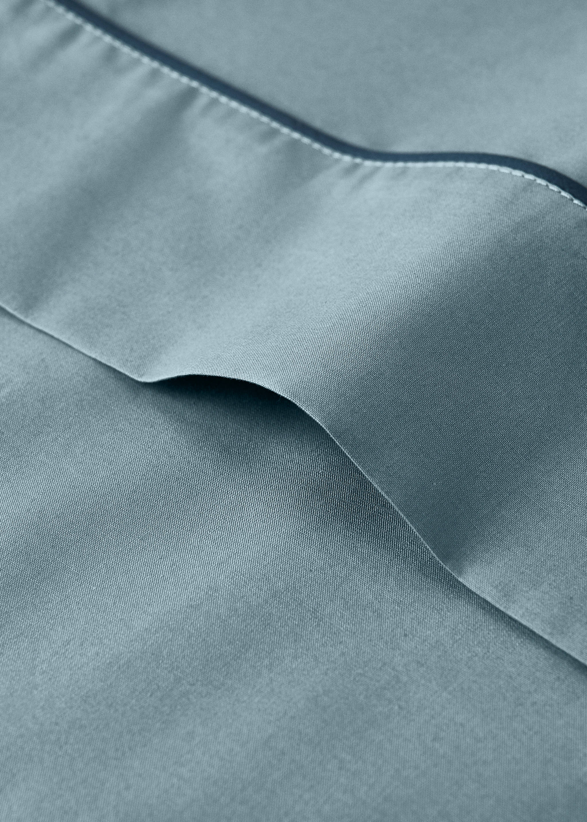Reversible percale cotton top sheet with contrasting piping for 90 cm bed - Details of the article 1