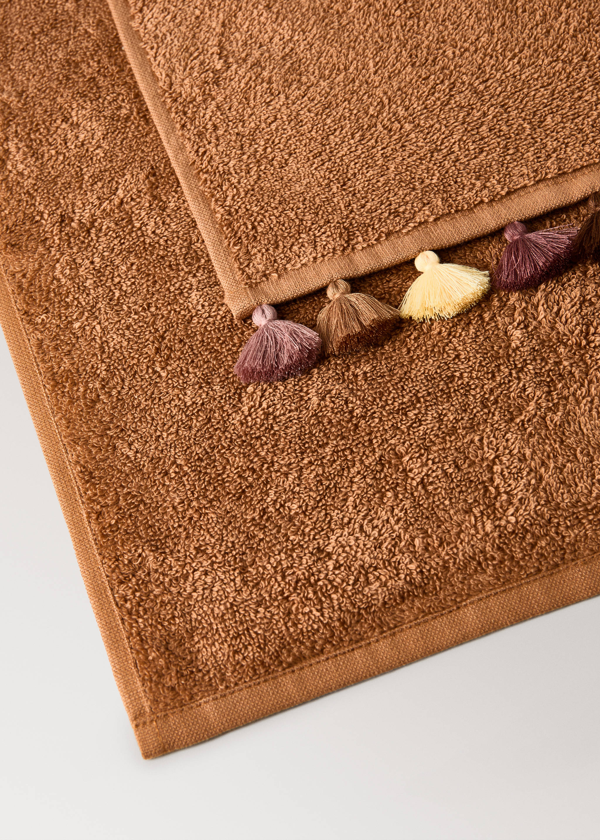 Katoenen kinderhanddoek met meerkleurige pompons - Detail van het artikel 1