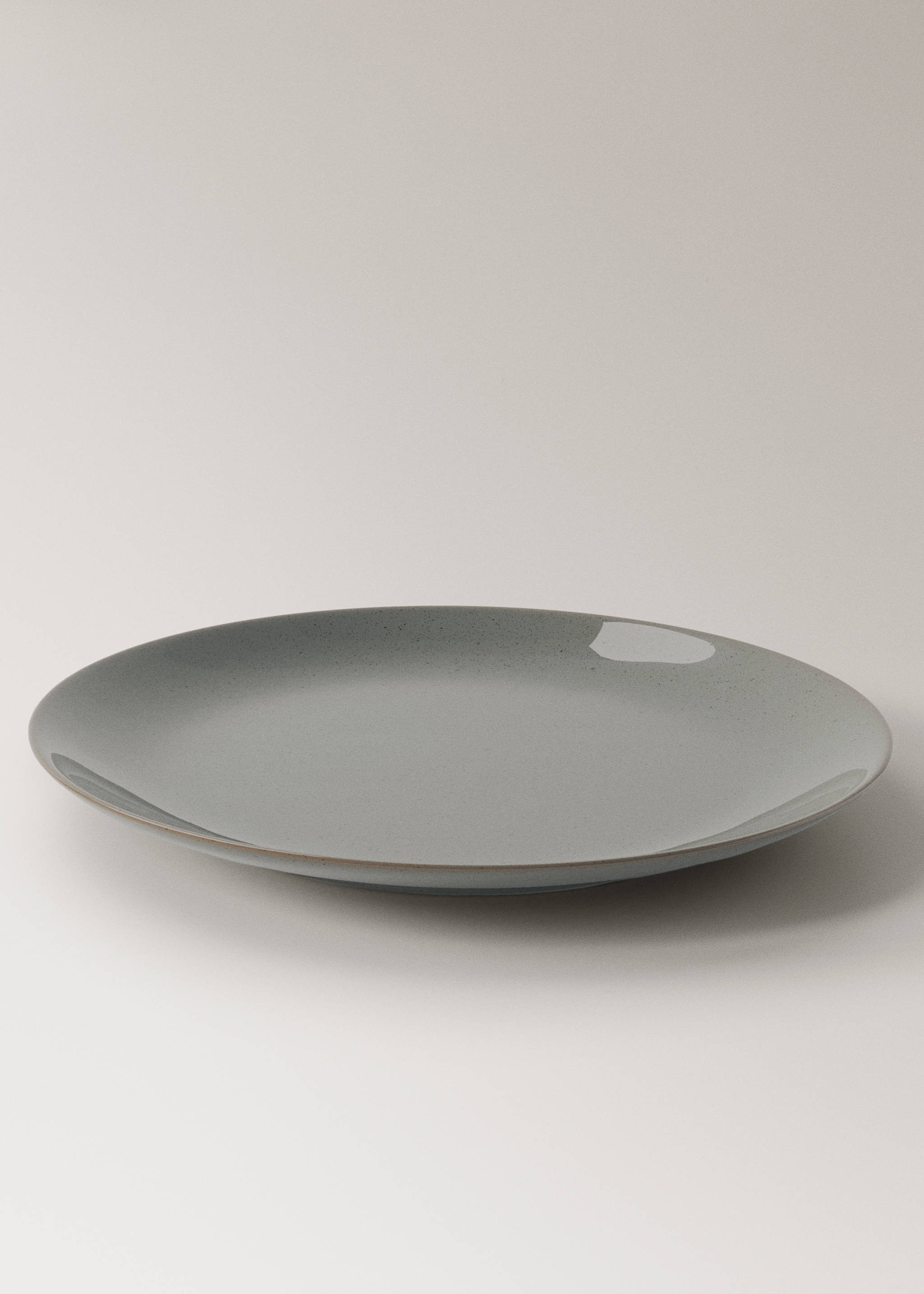 Stoneware dessert plate with spots - Details of the article 1