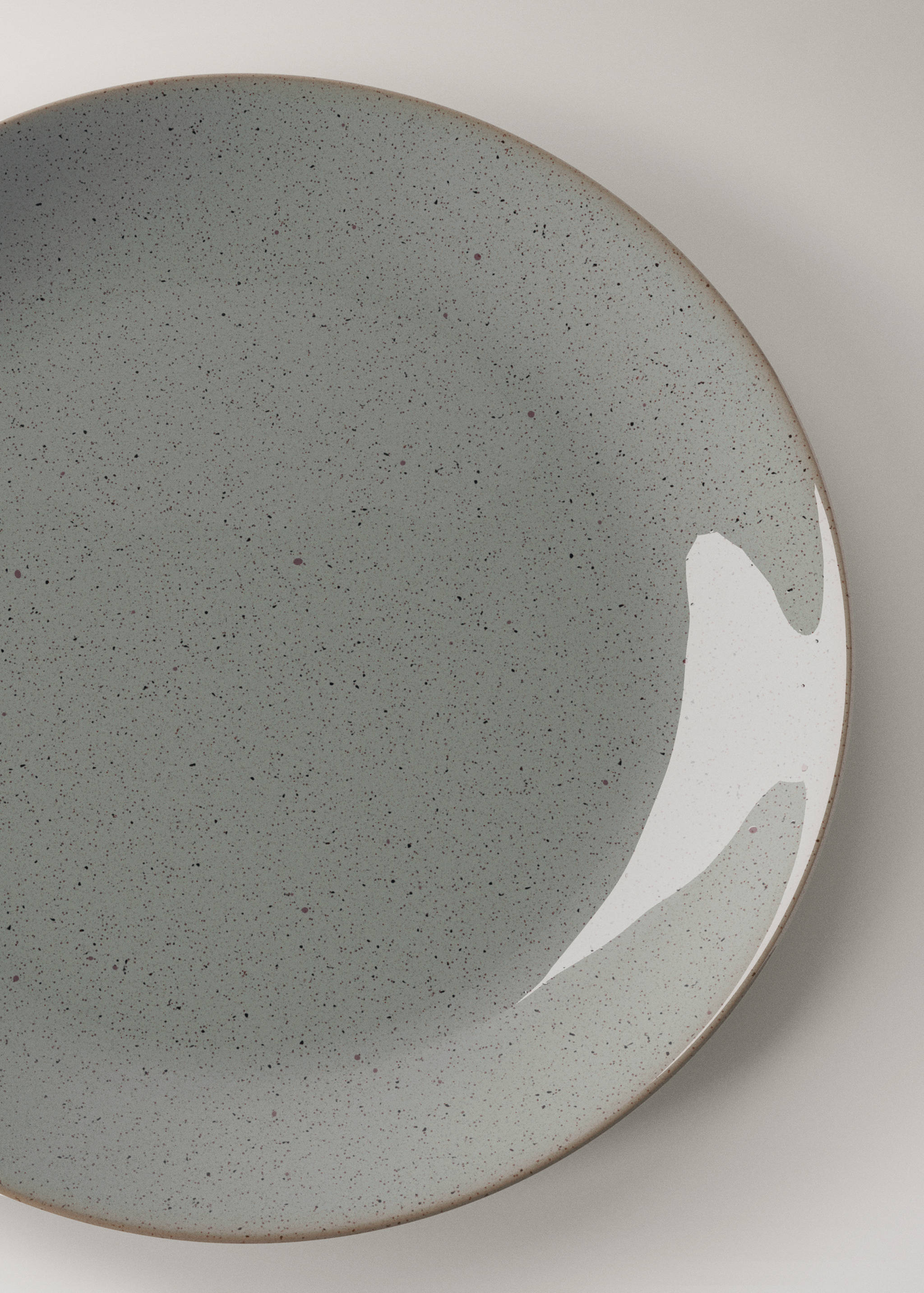 Stoneware dessert plate with spots - Details of the article 2