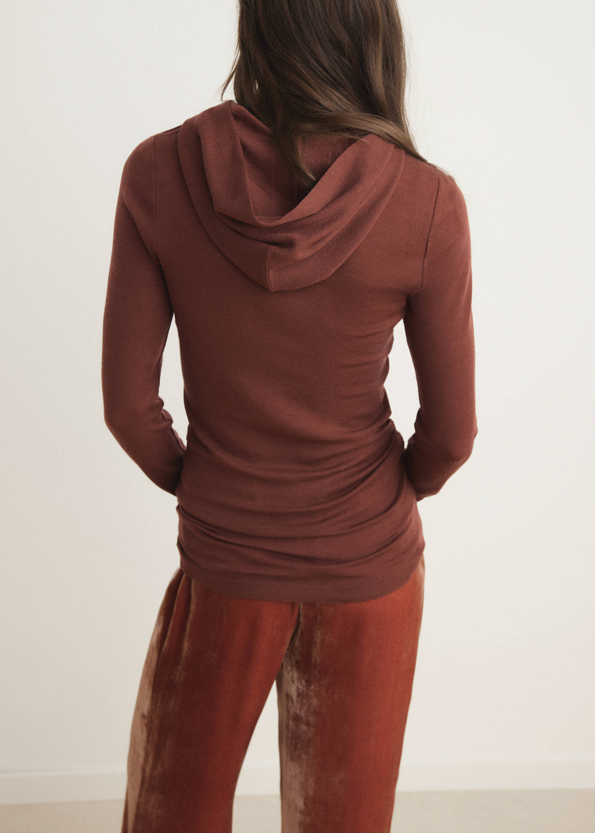 Ulltröja med huva - Artikelns baksida