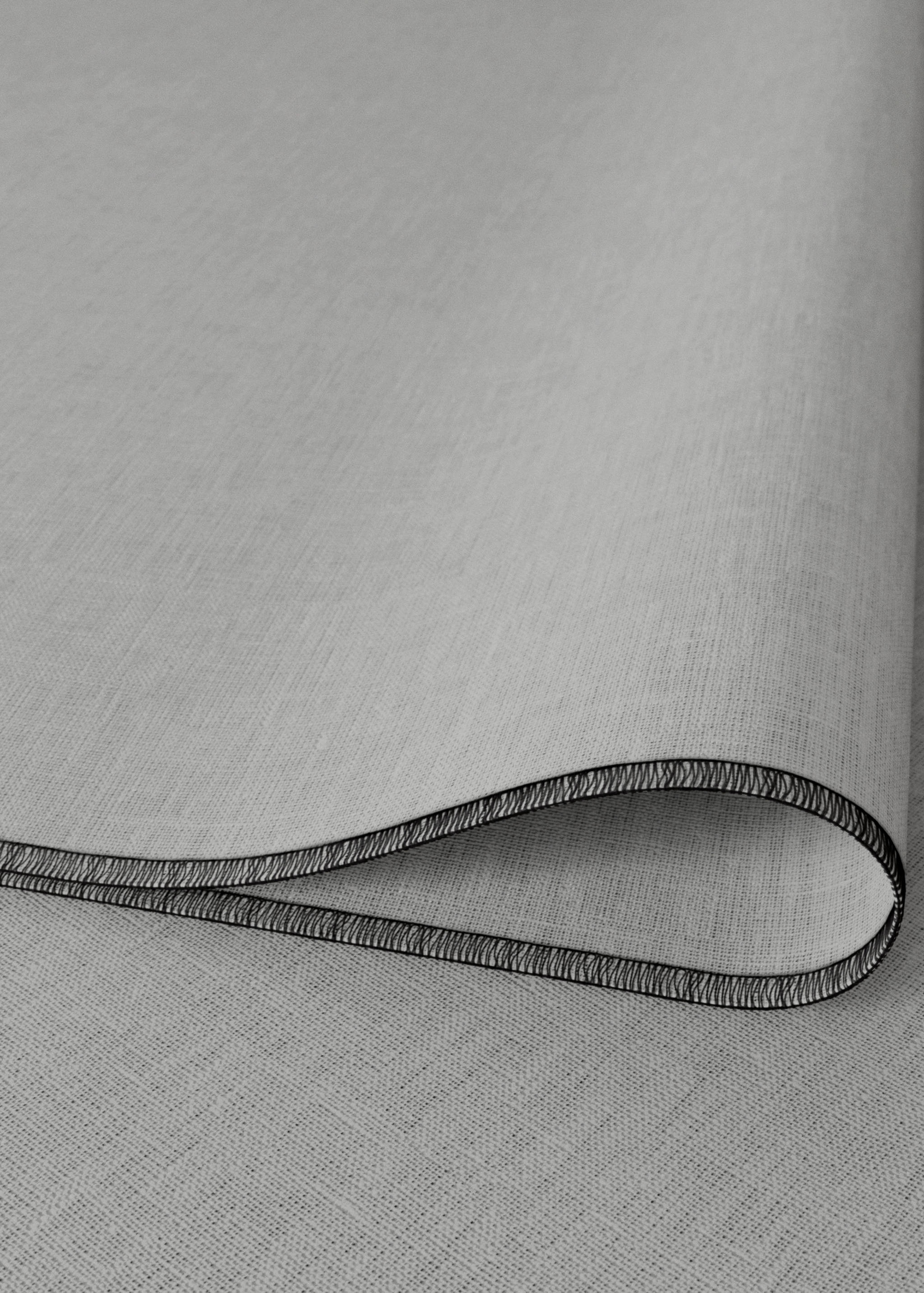 Estovalles individuals 100% lli amb overlock contrast - Detall de l'article 1