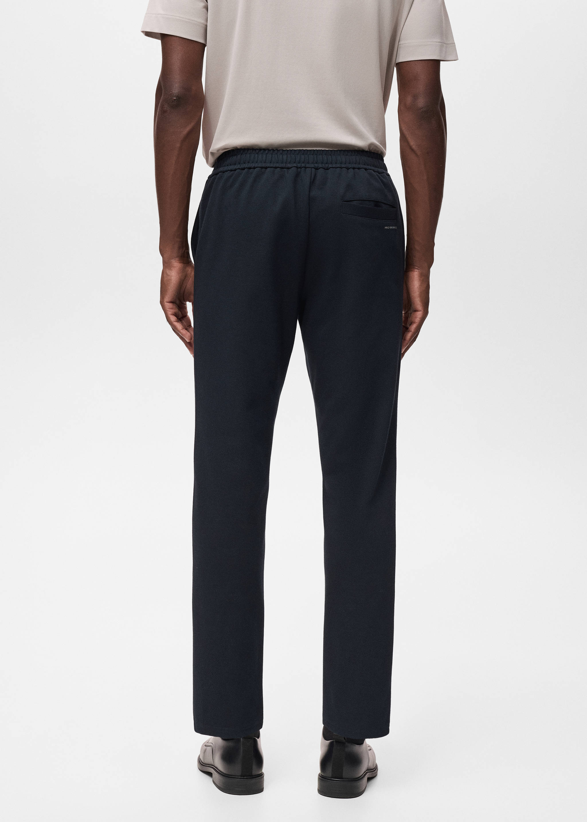 Technical structured joggers - Reverse of the article